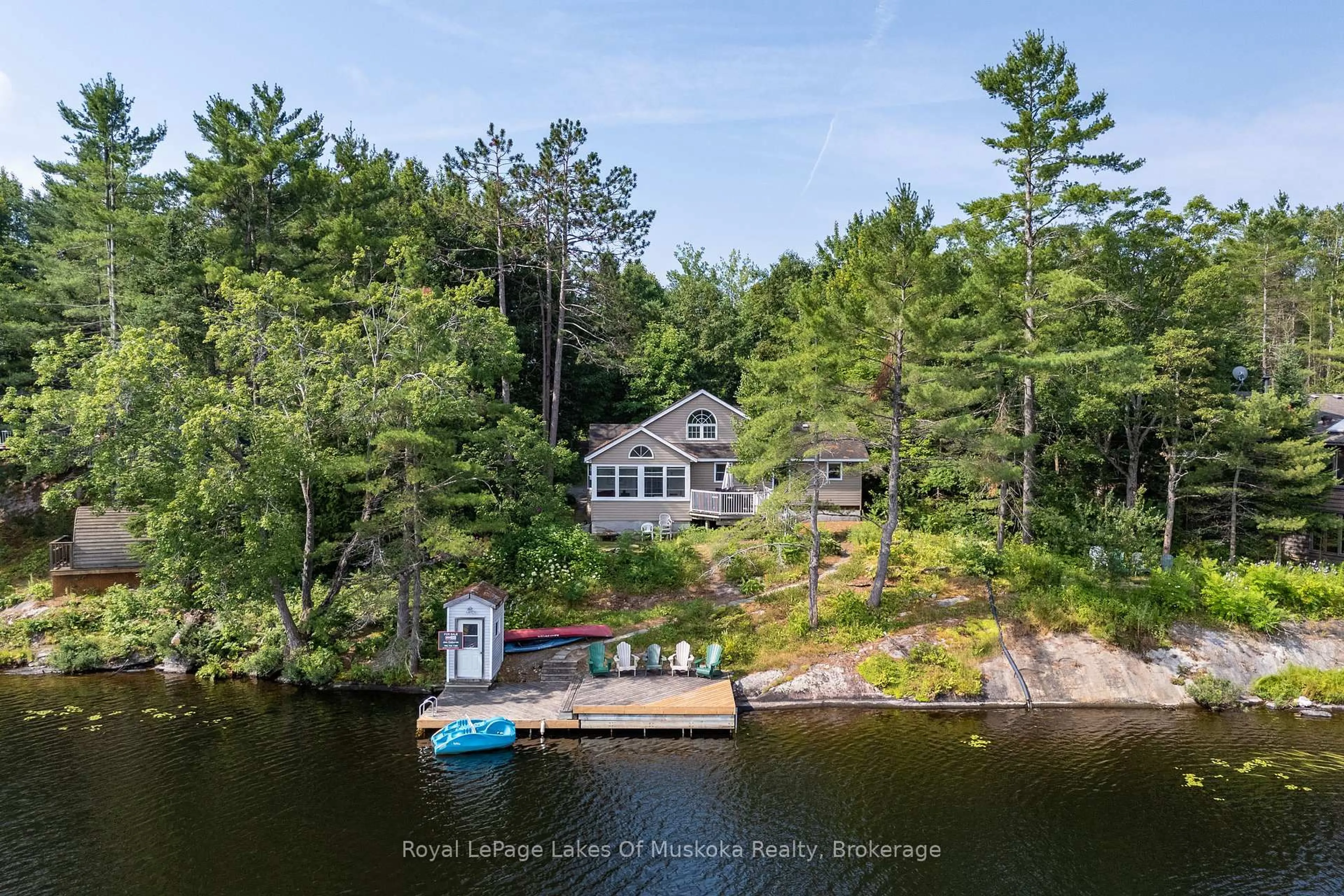 A pic from outside/outdoor area/front of a property/back of a property/a pic from drone, water/lake/river/ocean view for 49 Pinetree Rd, Gravenhurst Ontario P1P 1R2