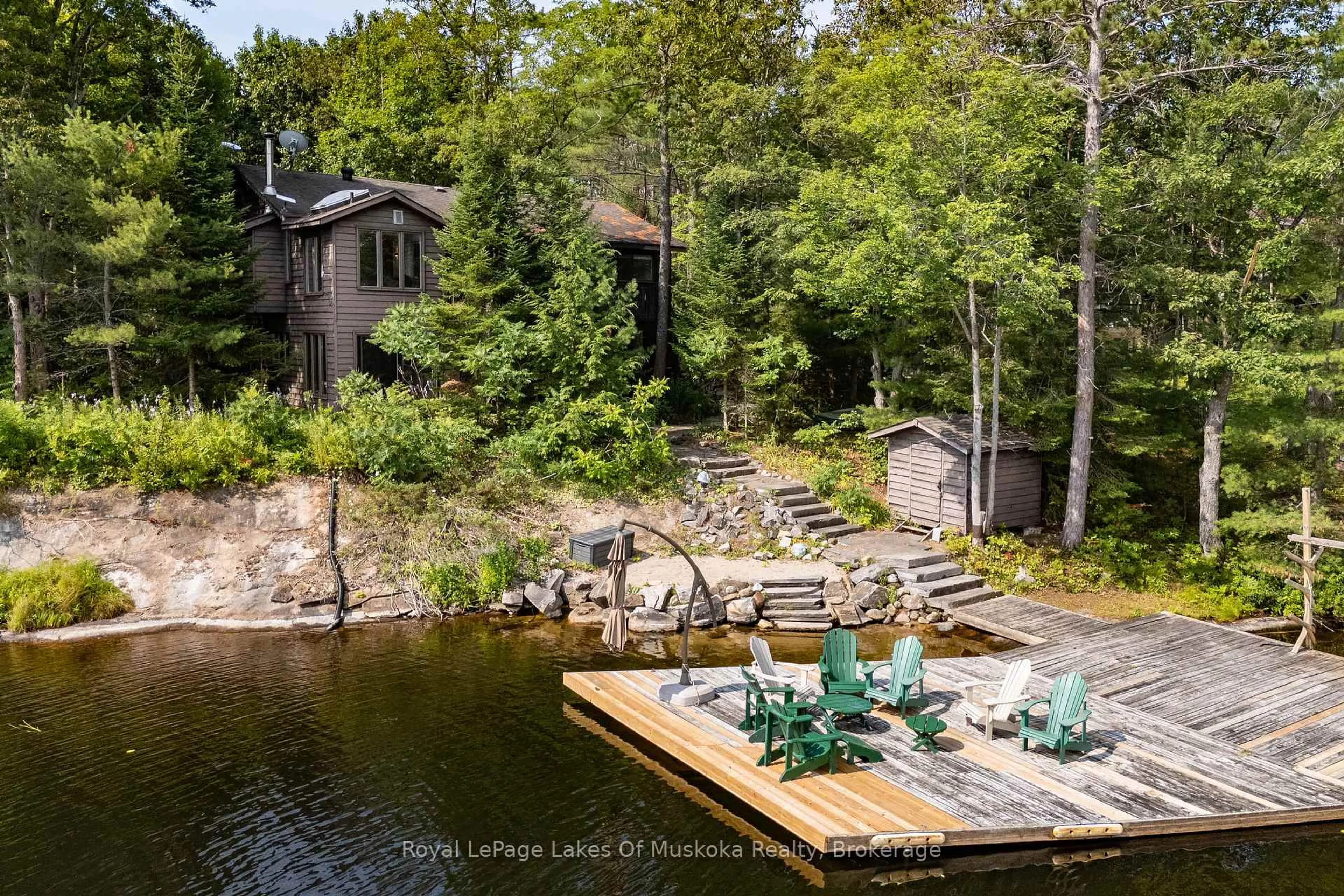 A pic from outside/outdoor area/front of a property/back of a property/a pic from drone, water/lake/river/ocean view for 51 Pinetree Rd, Gravenhurst Ontario P1P 1R2