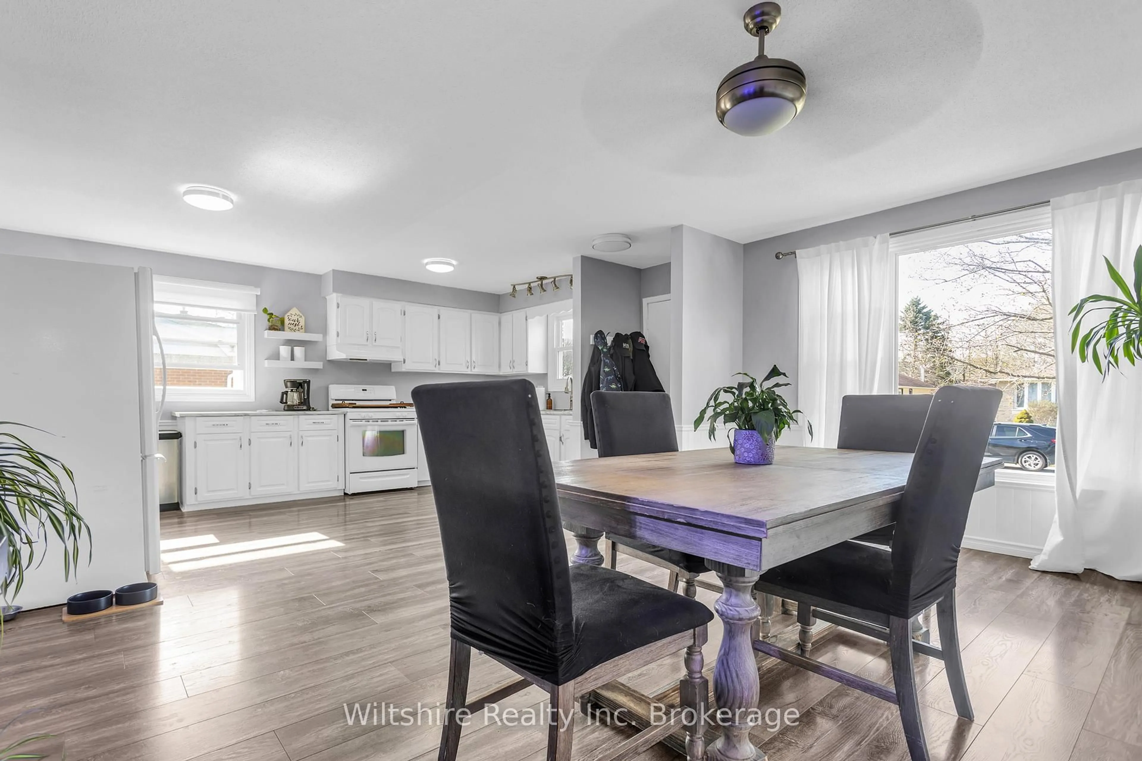 Open concept kitchen, wood/laminate floor for 47 Van Norman Dr, Tillsonburg Ontario N4G 4S9