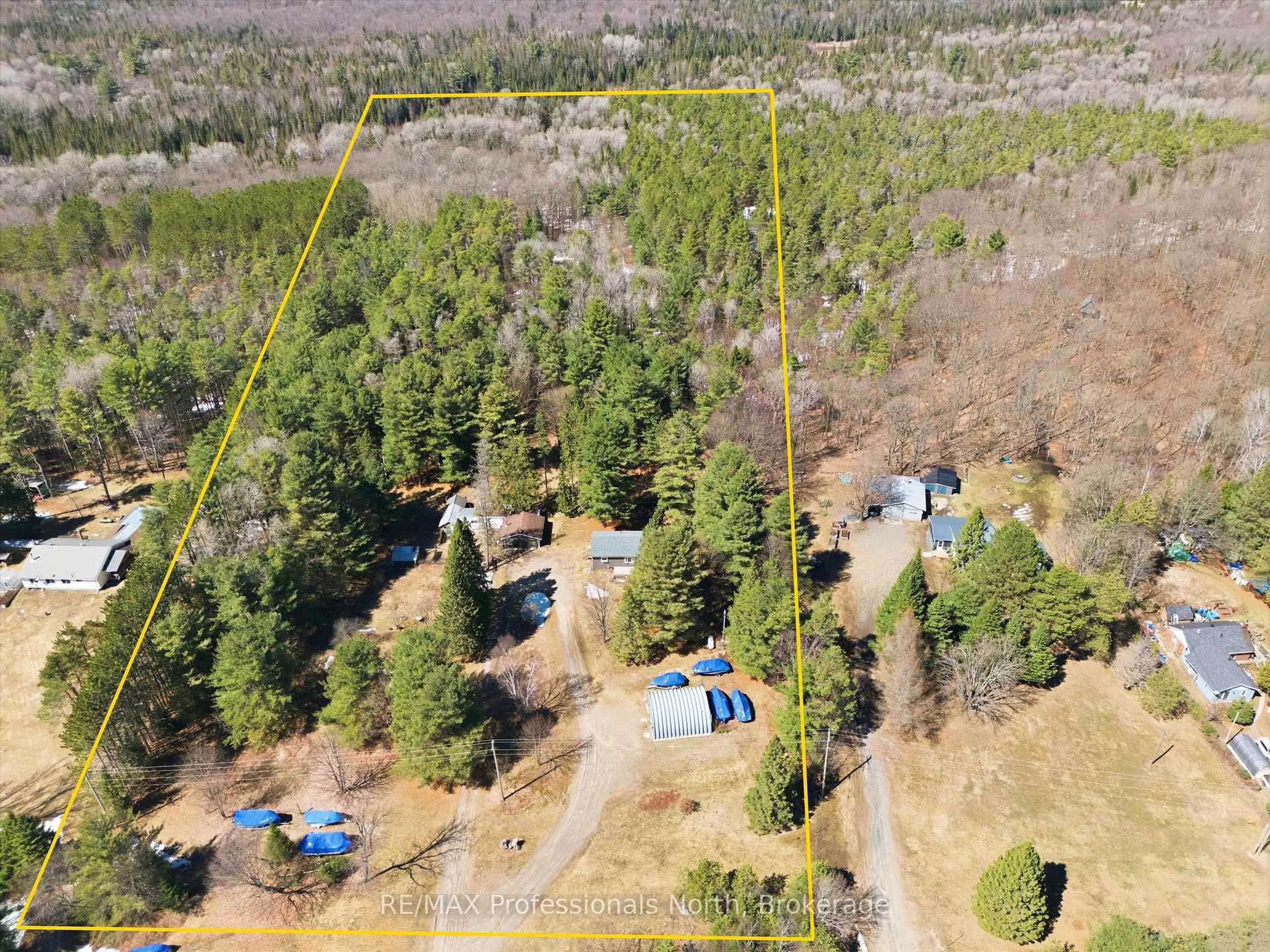 A pic from outside/outdoor area/front of a property/back of a property/a pic from drone, forest/trees view for 2352 518 Highway, McMurrich/Monteith Ontario P0A 1Y0