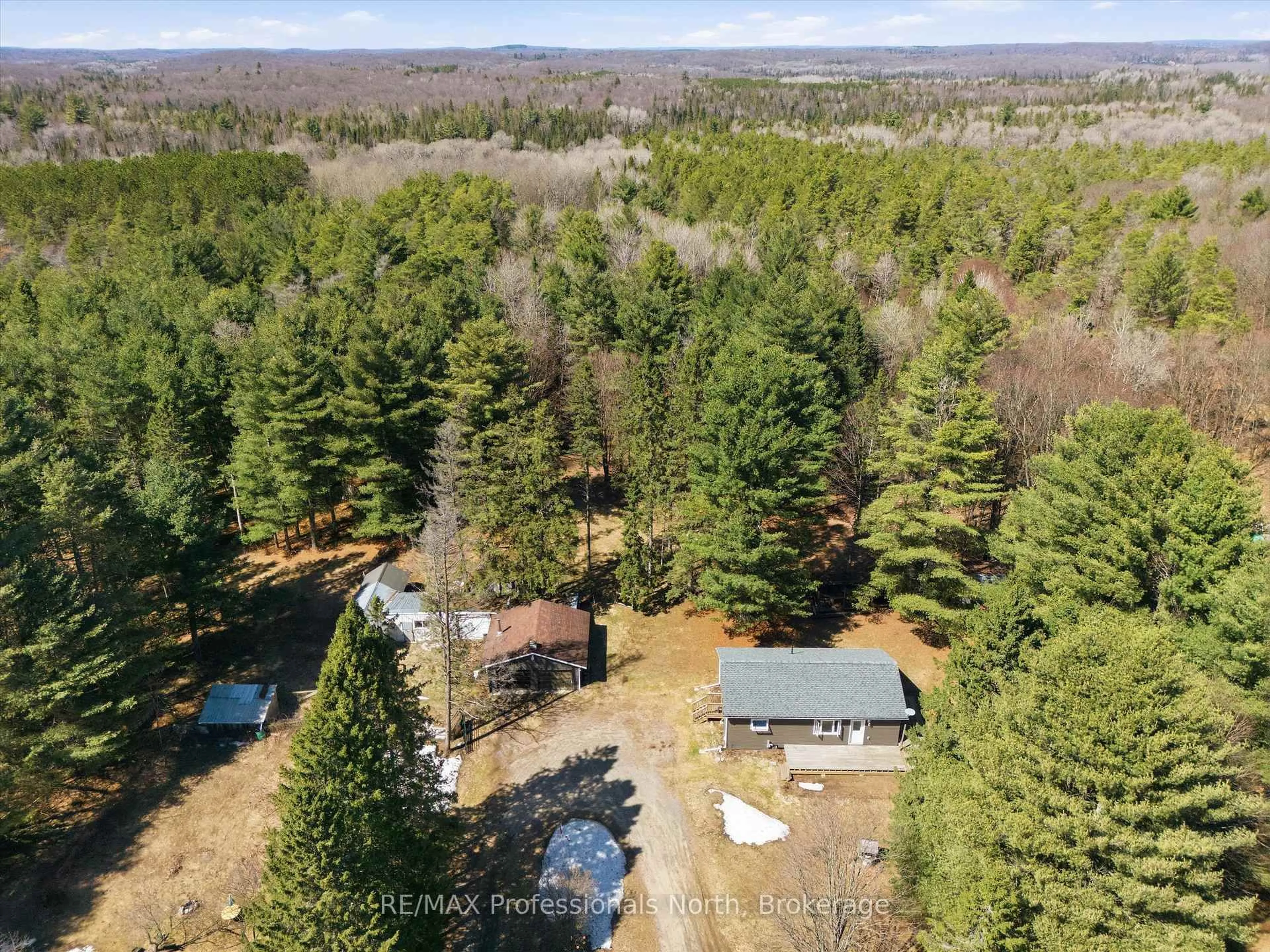 A pic from outside/outdoor area/front of a property/back of a property/a pic from drone, forest/trees view for 2352 518 Highway, McMurrich/Monteith Ontario P0A 1Y0