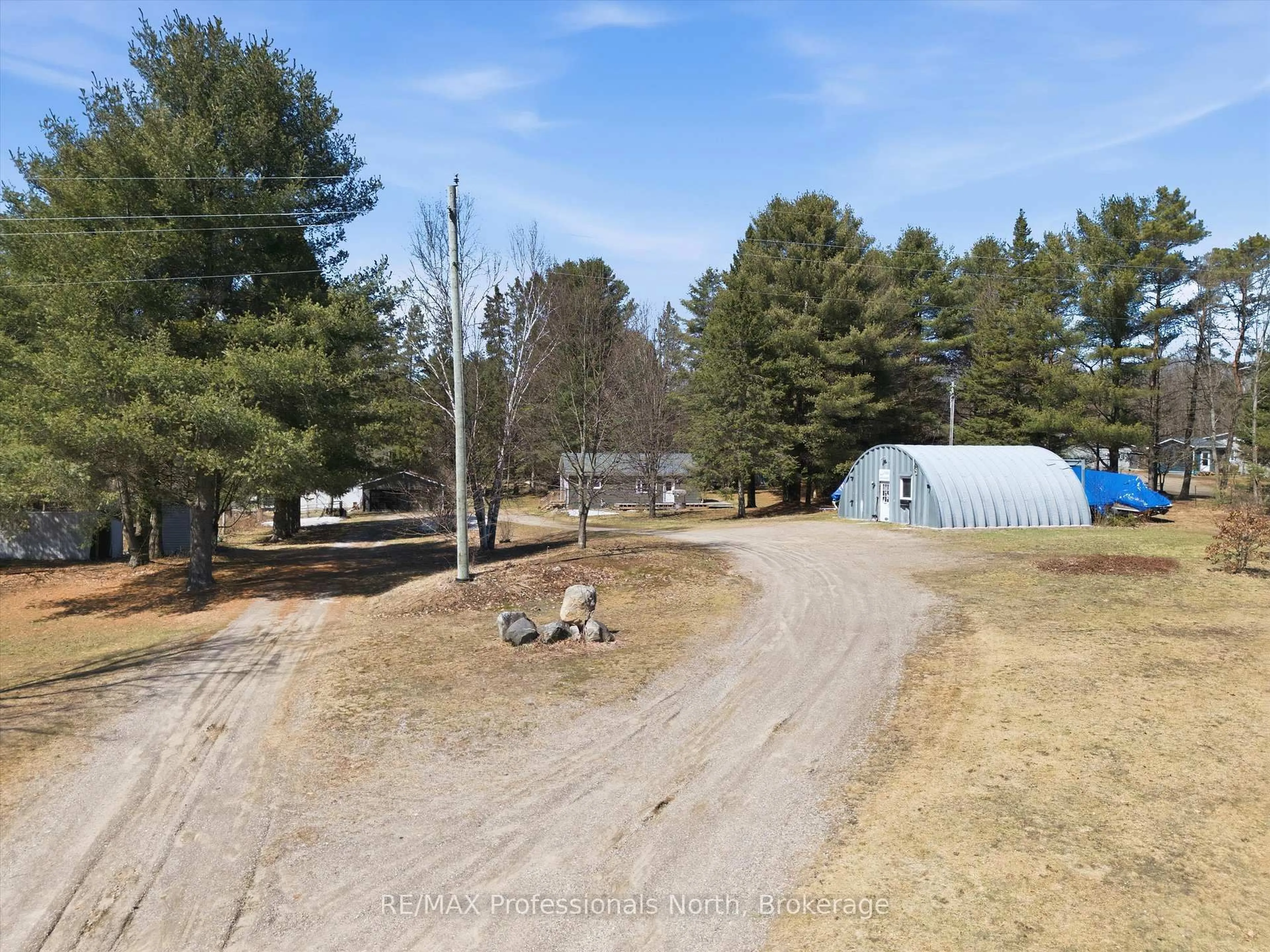 A pic from outside/outdoor area/front of a property/back of a property/a pic from drone, street for 2352 518 Highway, McMurrich/Monteith Ontario P0A 1Y0