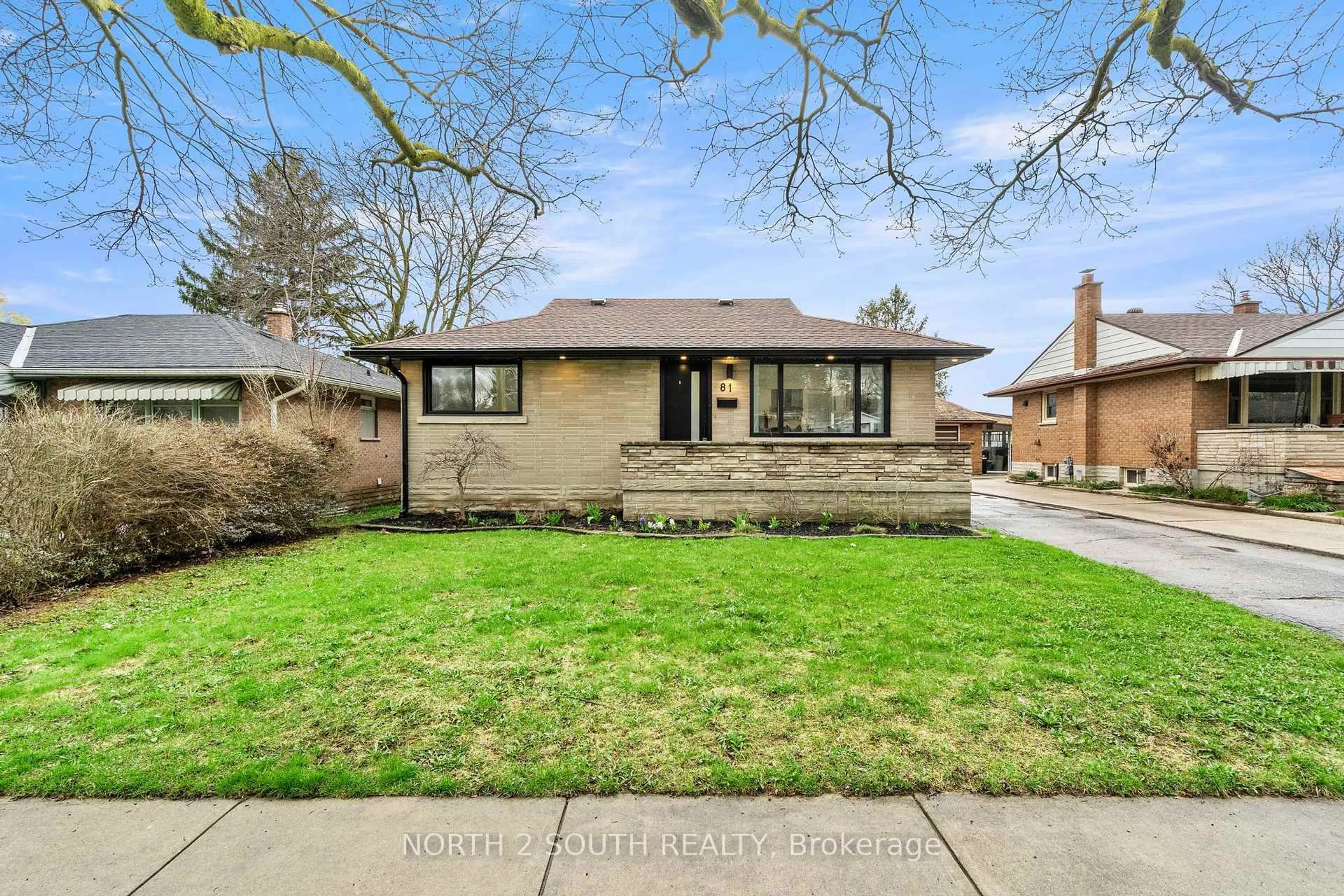Home with brick exterior material, street for 81 Clark Ave, Kitchener Ontario N2C 1Y1