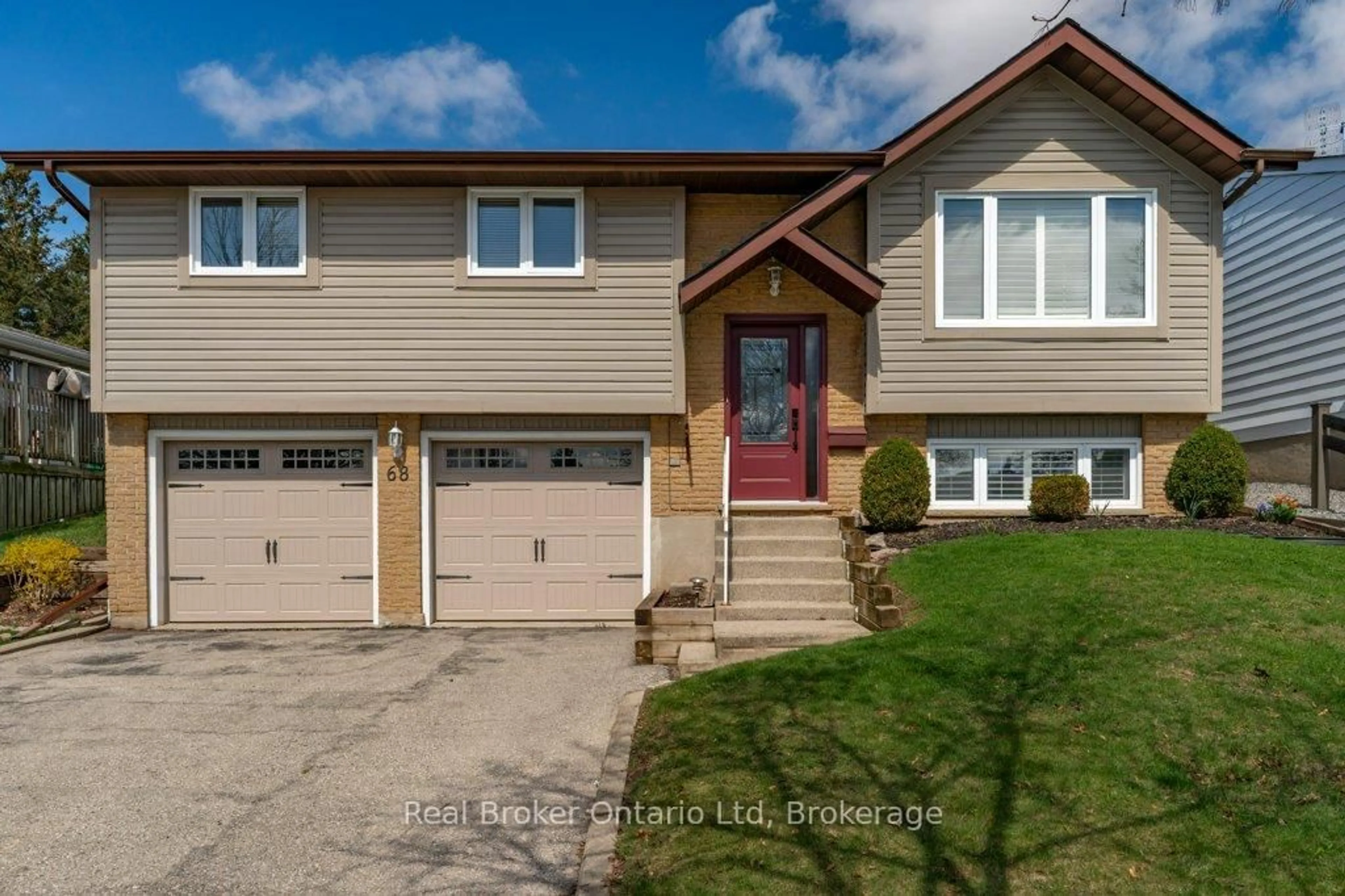 Home with vinyl exterior material, street for 68 Settlers Dr, Kitchener Ontario N2E 2L8