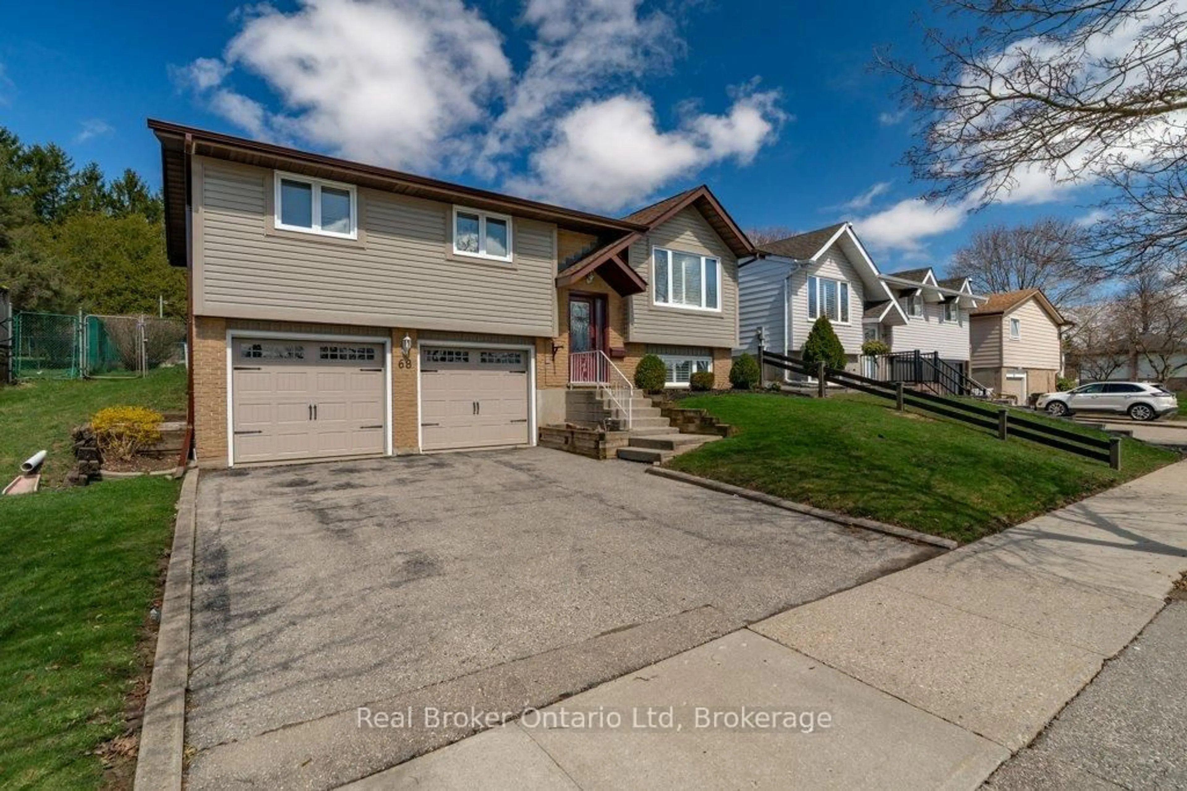 Home with vinyl exterior material, street for 68 Settlers Dr, Kitchener Ontario N2E 2L8