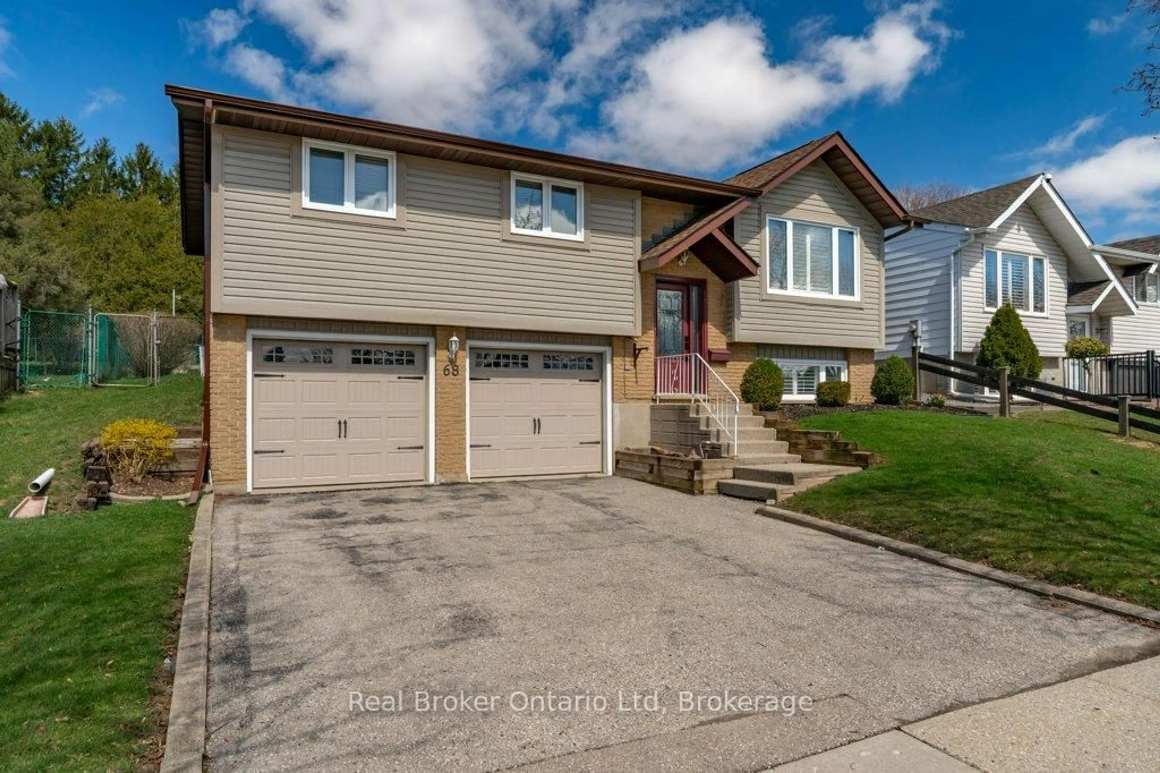 Home with vinyl exterior material, street for 68 Settlers Dr, Kitchener Ontario N2E 2L8