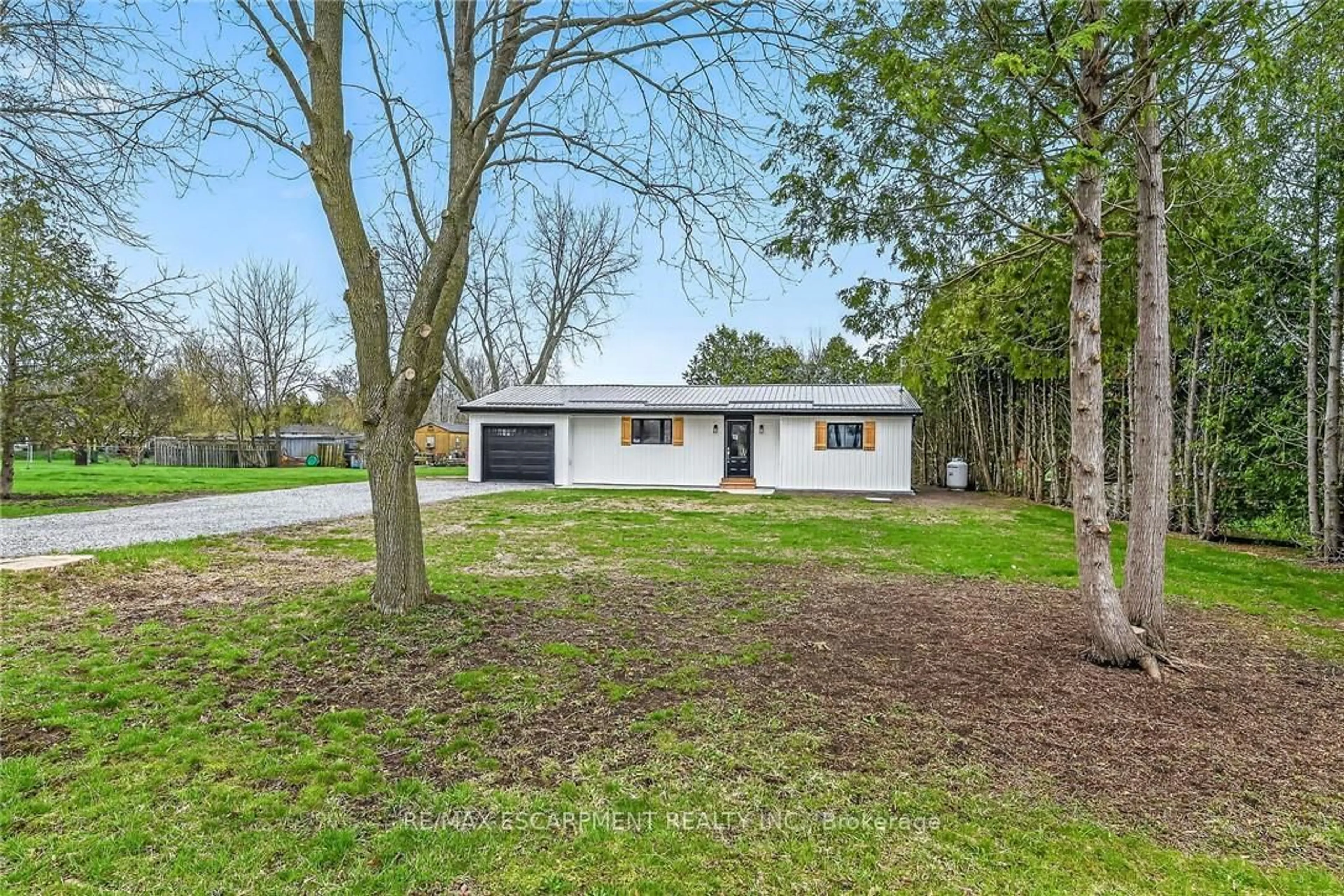 A pic from outside/outdoor area/front of a property/back of a property/a pic from drone, street for 548 CONCESSION 14 Rd, Haldimand Ontario N0A 1H0