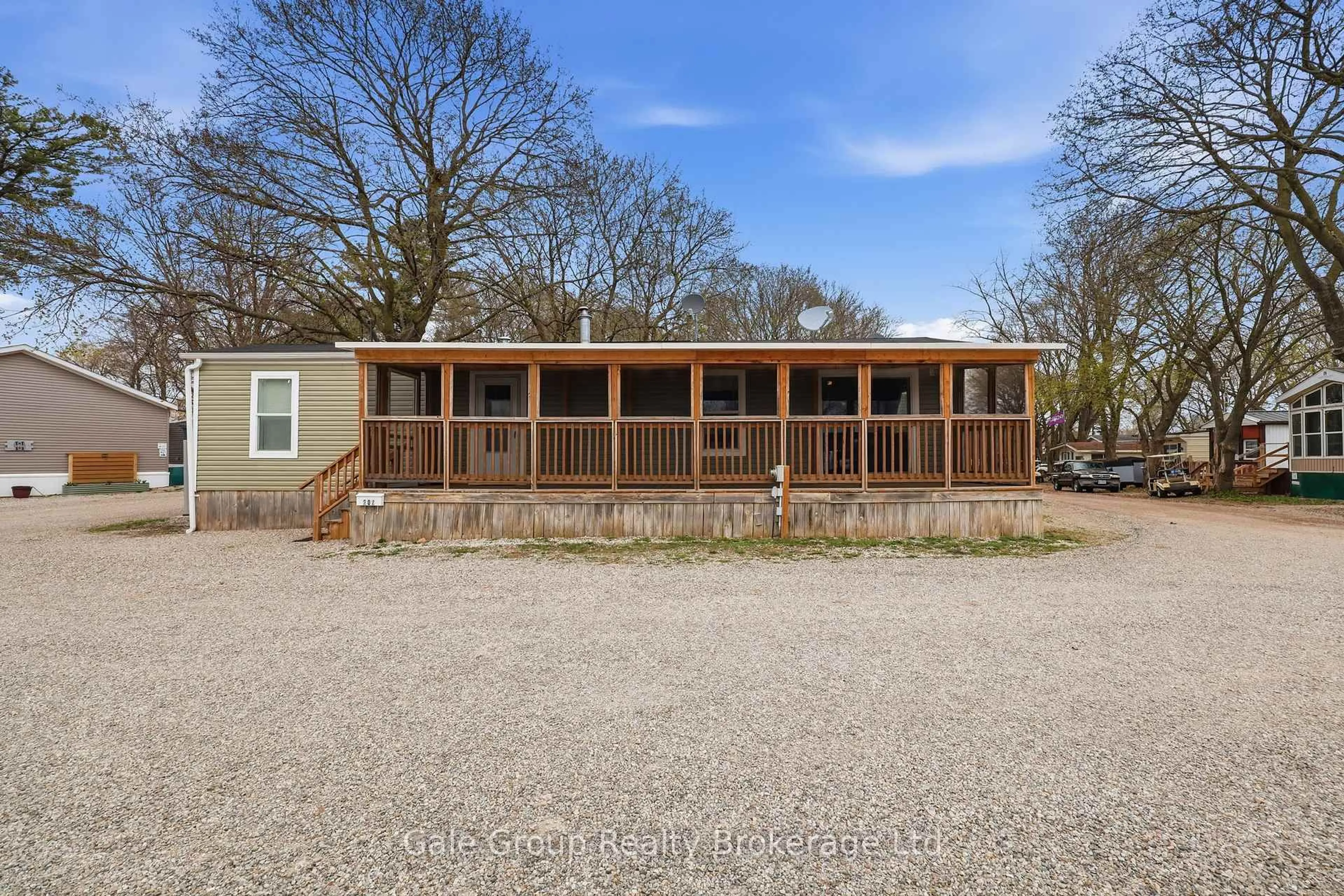 A pic from outside/outdoor area/front of a property/back of a property/a pic from drone, unknown for 99 Fourth Concession Rd #Unit 202, Brant Ontario N0E 1A0