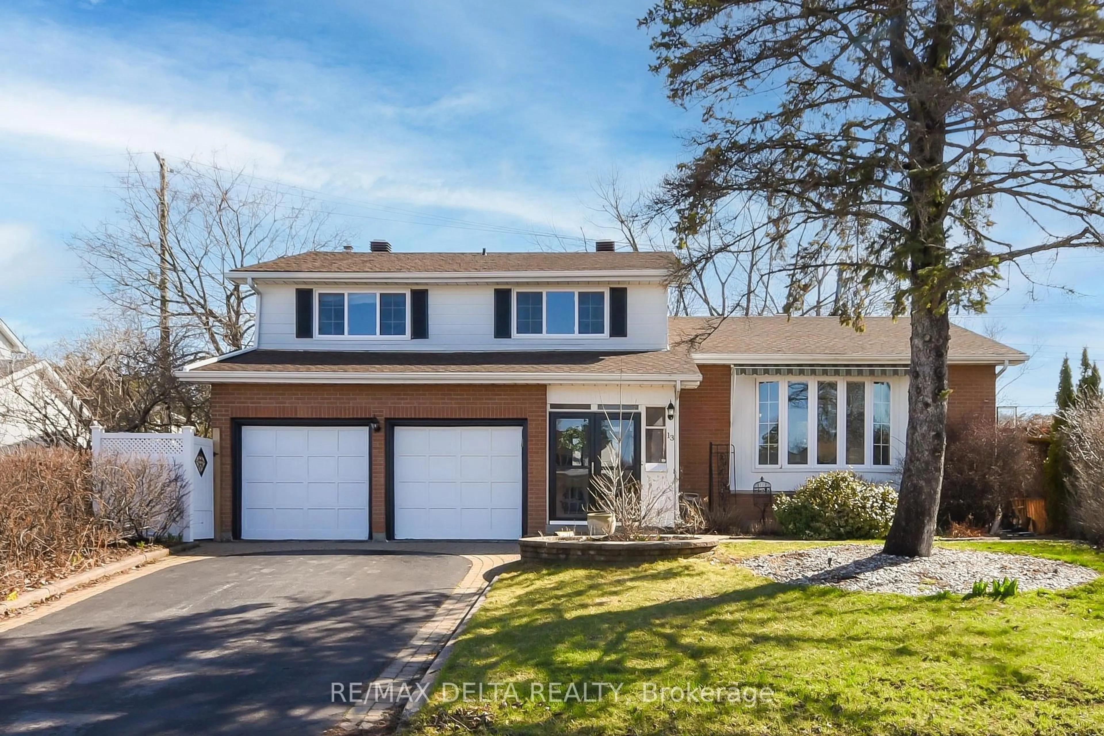 Home with brick exterior material, street for 13 Parklane Crt, Ottawa Ontario K1B 3H3