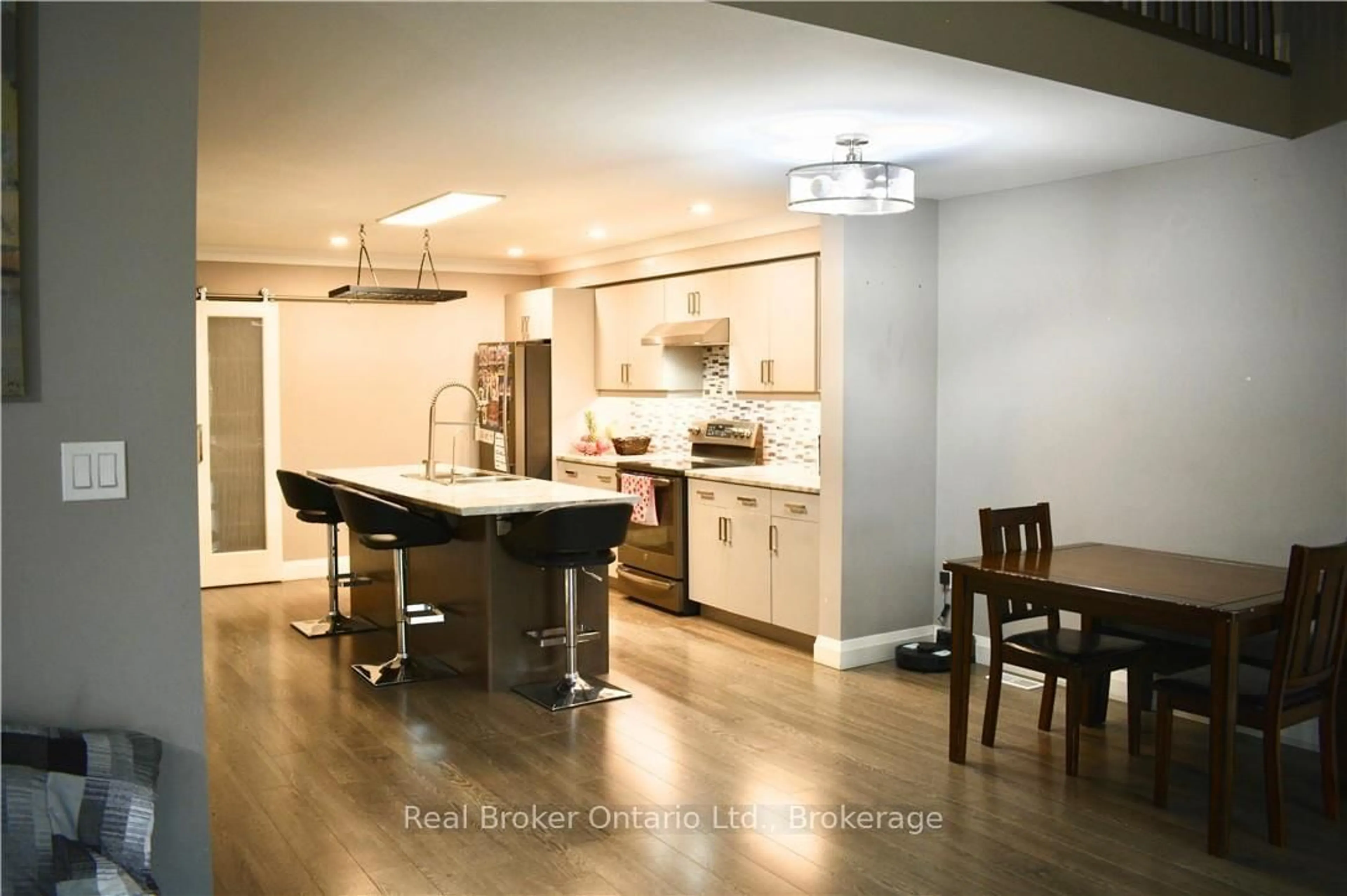 Open concept kitchen, wood/laminate floor for 1 Chamberlain Ave #9, Ingersoll Ontario N5C 0A3