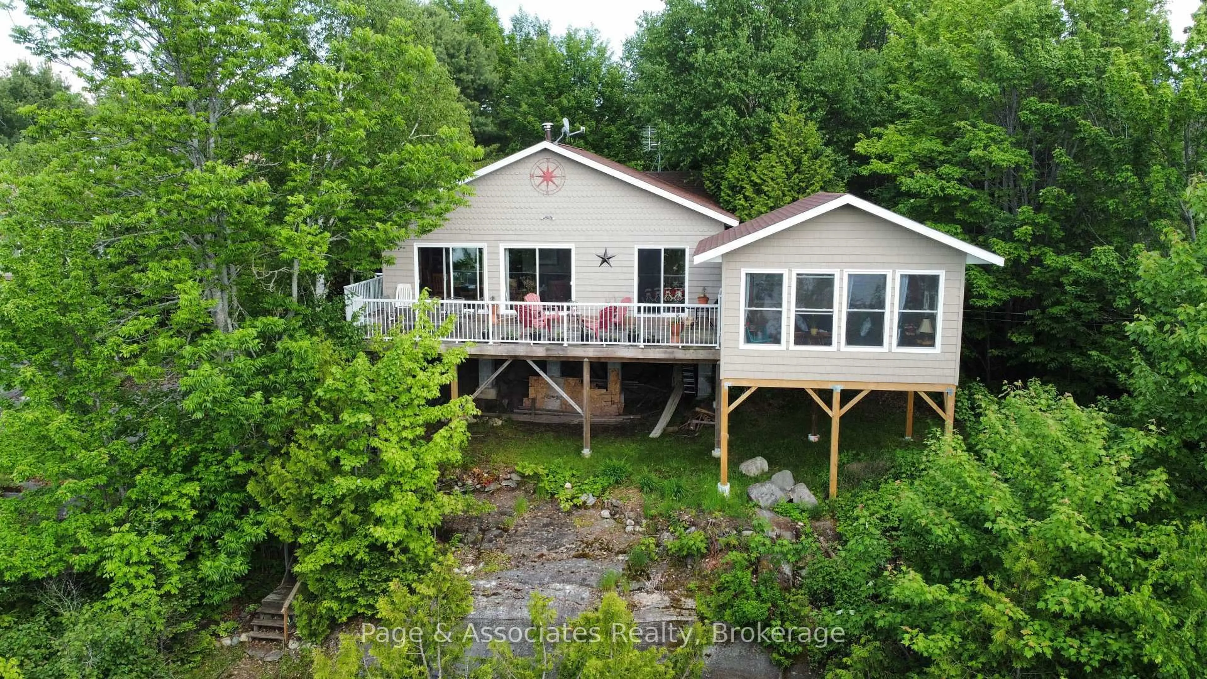A pic from outside/outdoor area/front of a property/back of a property/a pic from drone, water/lake/river/ocean view for 153 Robitaille Rd, West Nipissing Ontario P0H 1L0