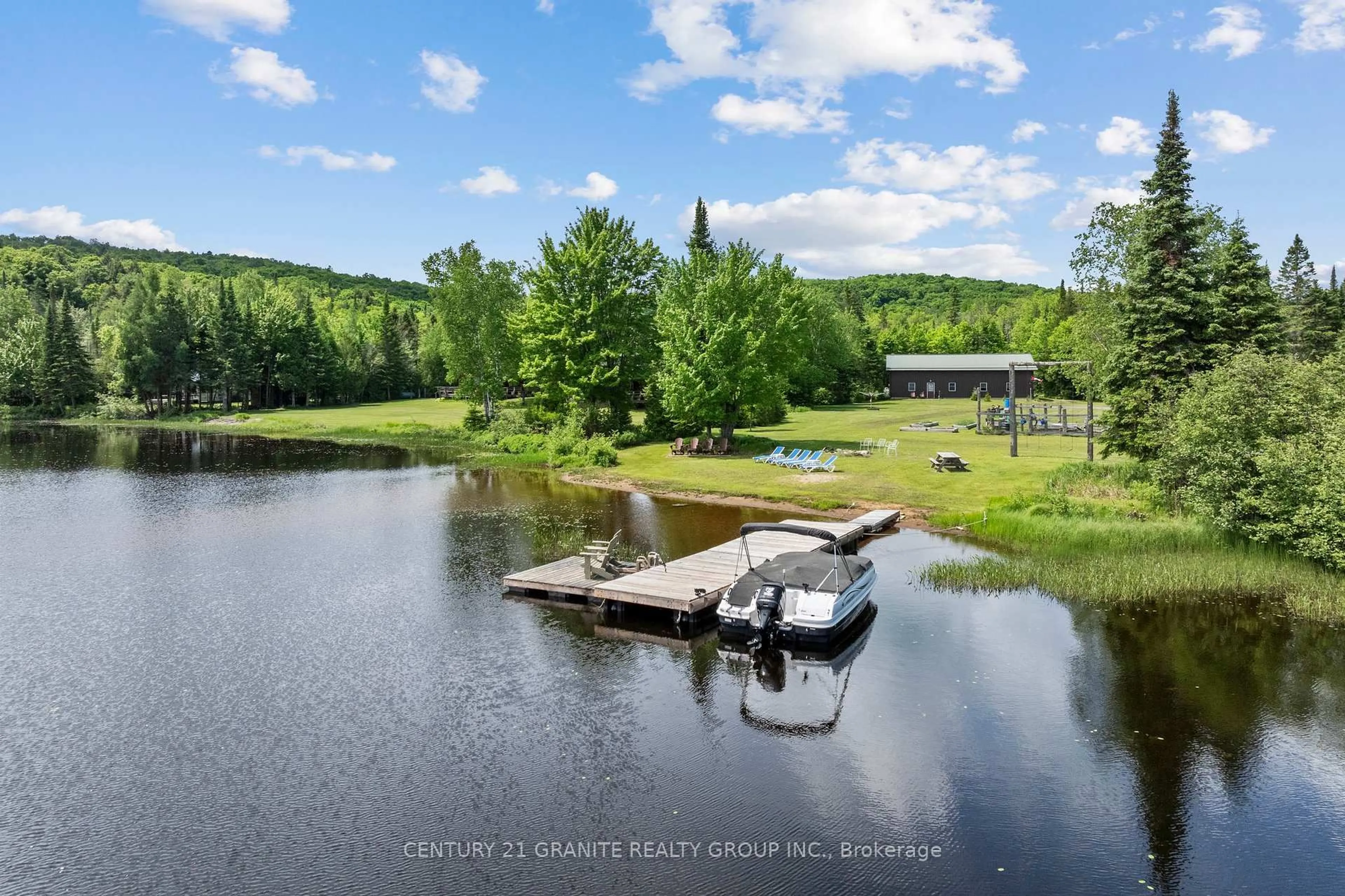A pic from outside/outdoor area/front of a property/back of a property/a pic from drone, water/lake/river/ocean view for 3493 South Baptiste Lake Rd, Highlands East Ontario K0L 2A0