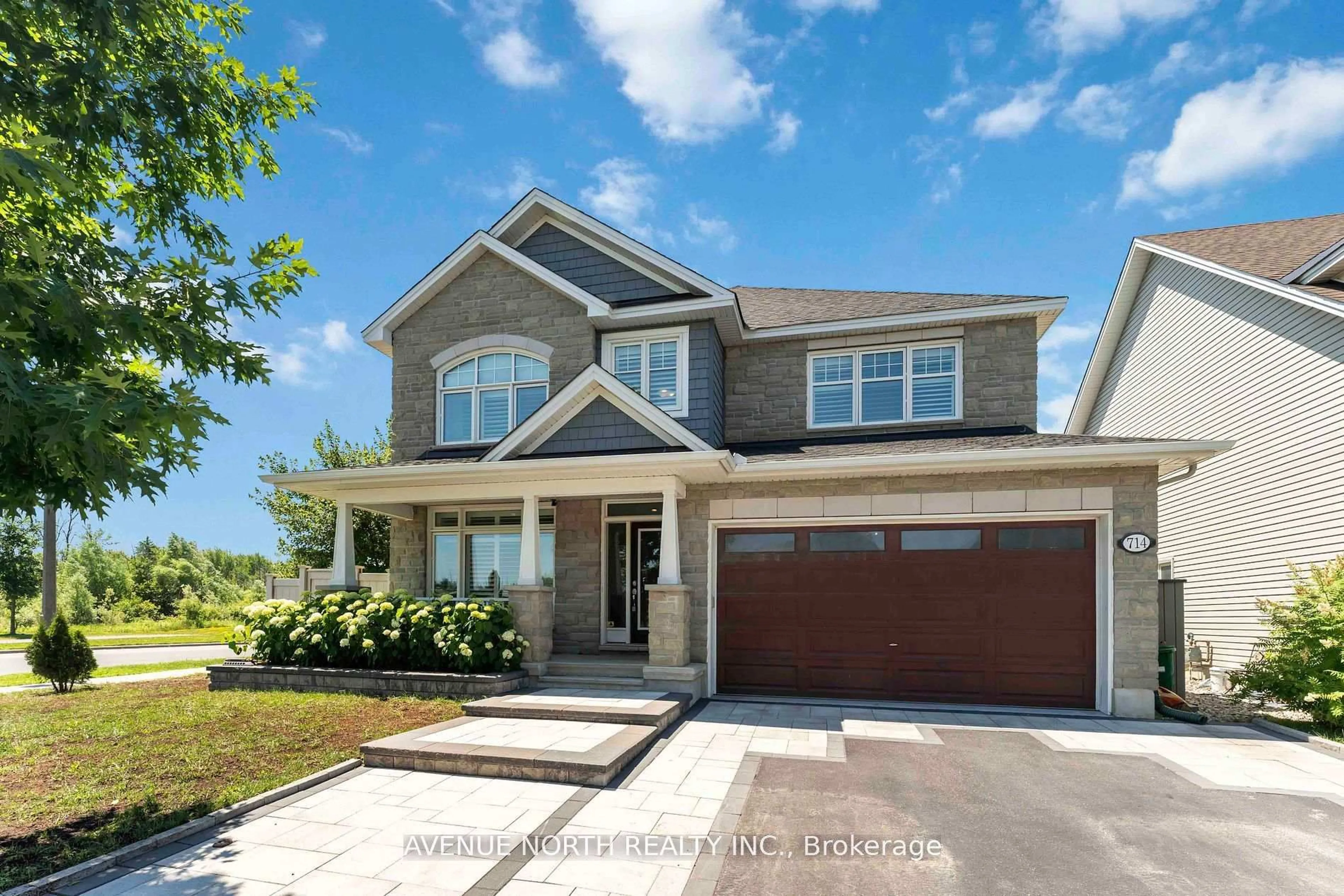 Home with vinyl exterior material, street for 714 BUNCHBERRY Way, Ottawa Ontario K1T 0J8