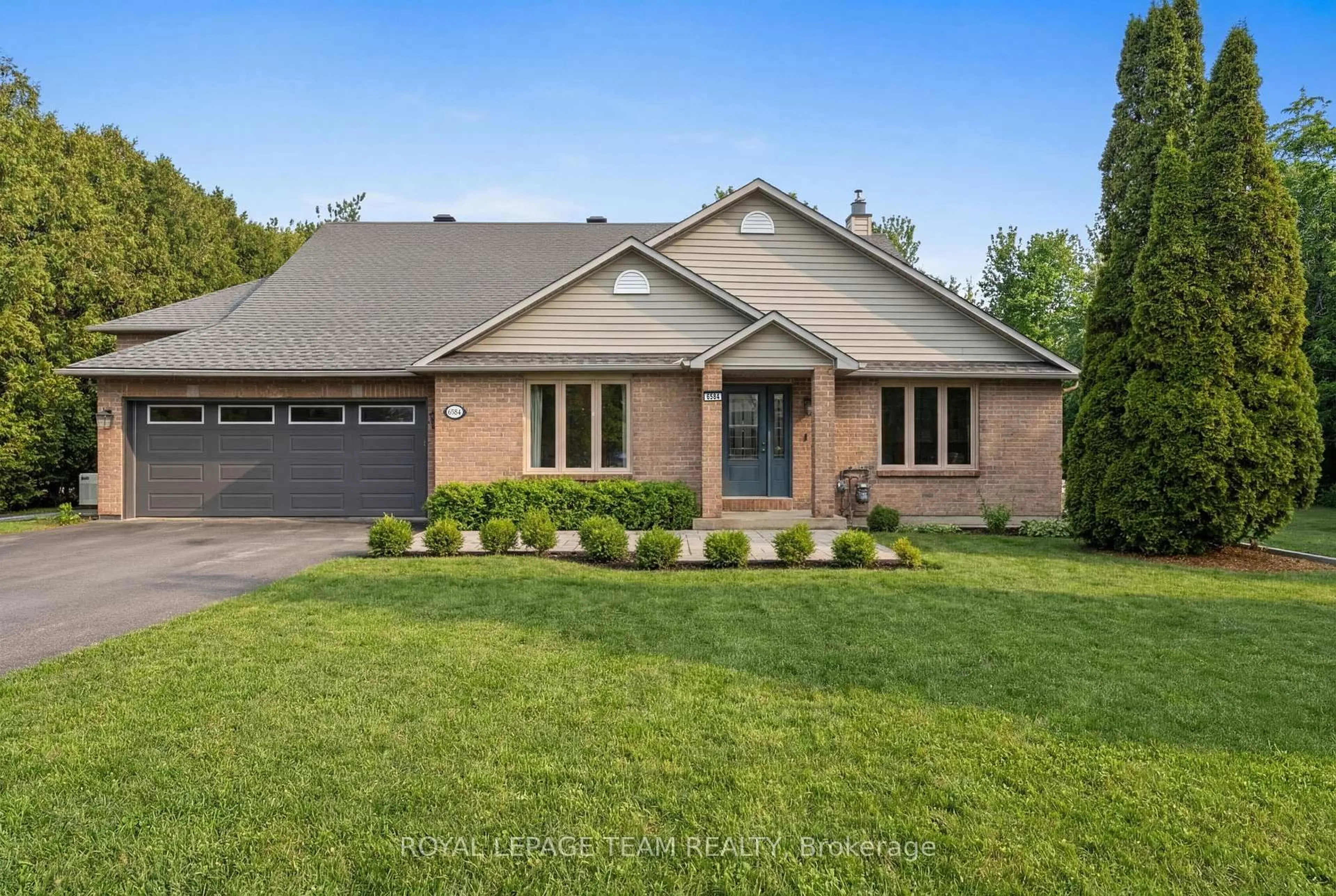 Home with brick exterior material, street for 6584 Harvest Grove Dr, Ottawa Ontario K4P 1E9