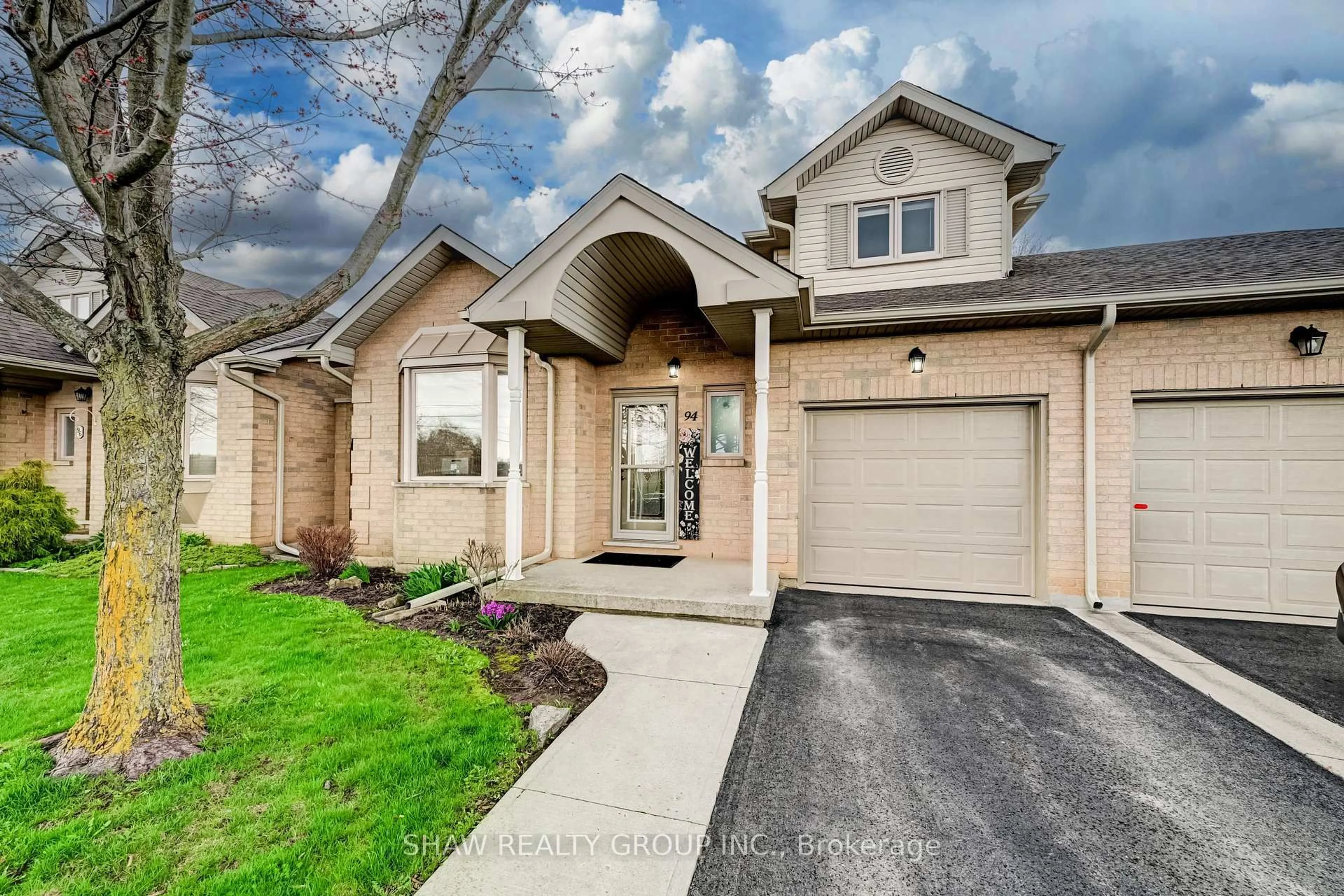 Home with brick exterior material, street for 94 Greentrail Dr #44, Hamilton Ontario L0R 1W0