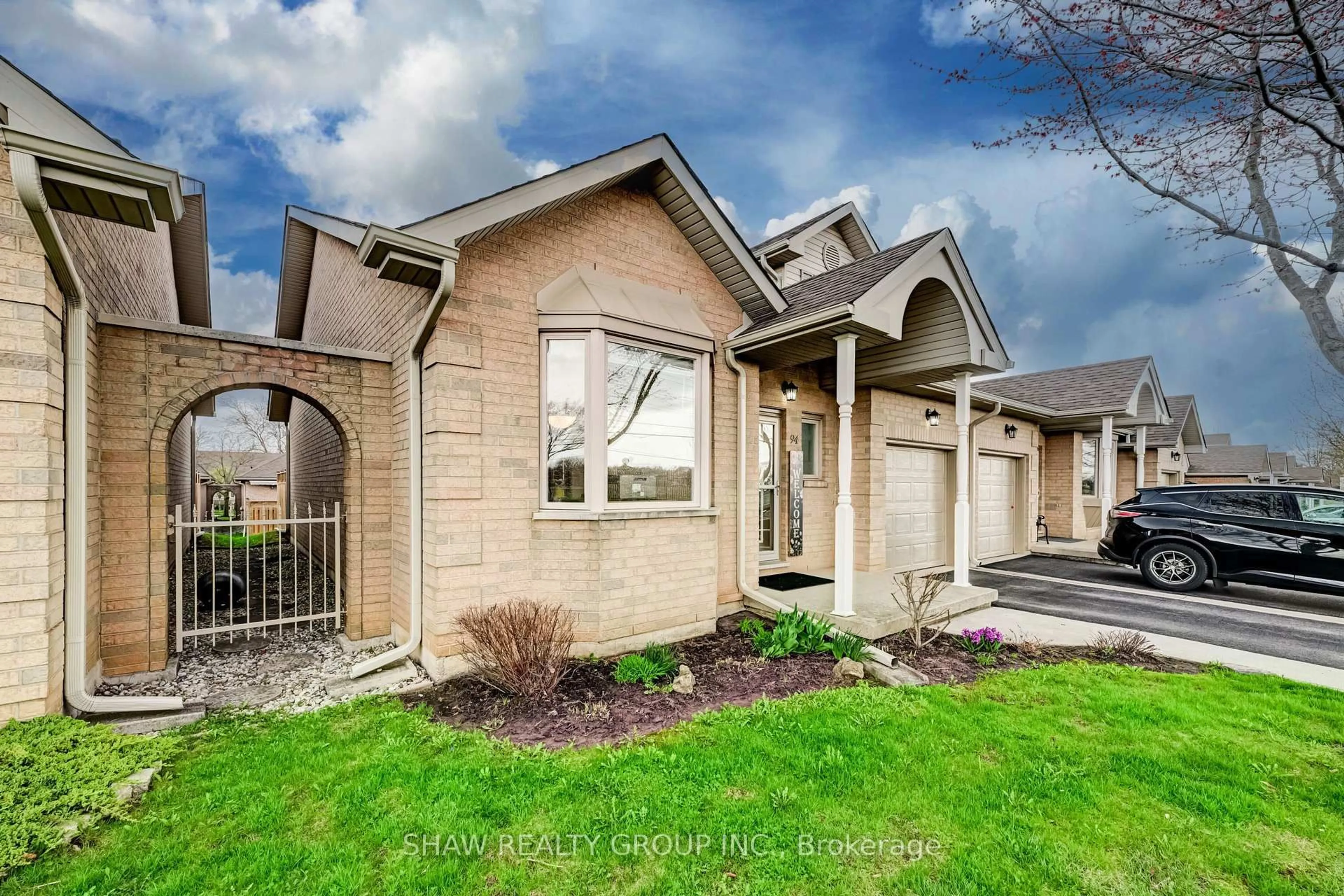 Home with brick exterior material, street for 94 Greentrail Dr #44, Hamilton Ontario L0R 1W0