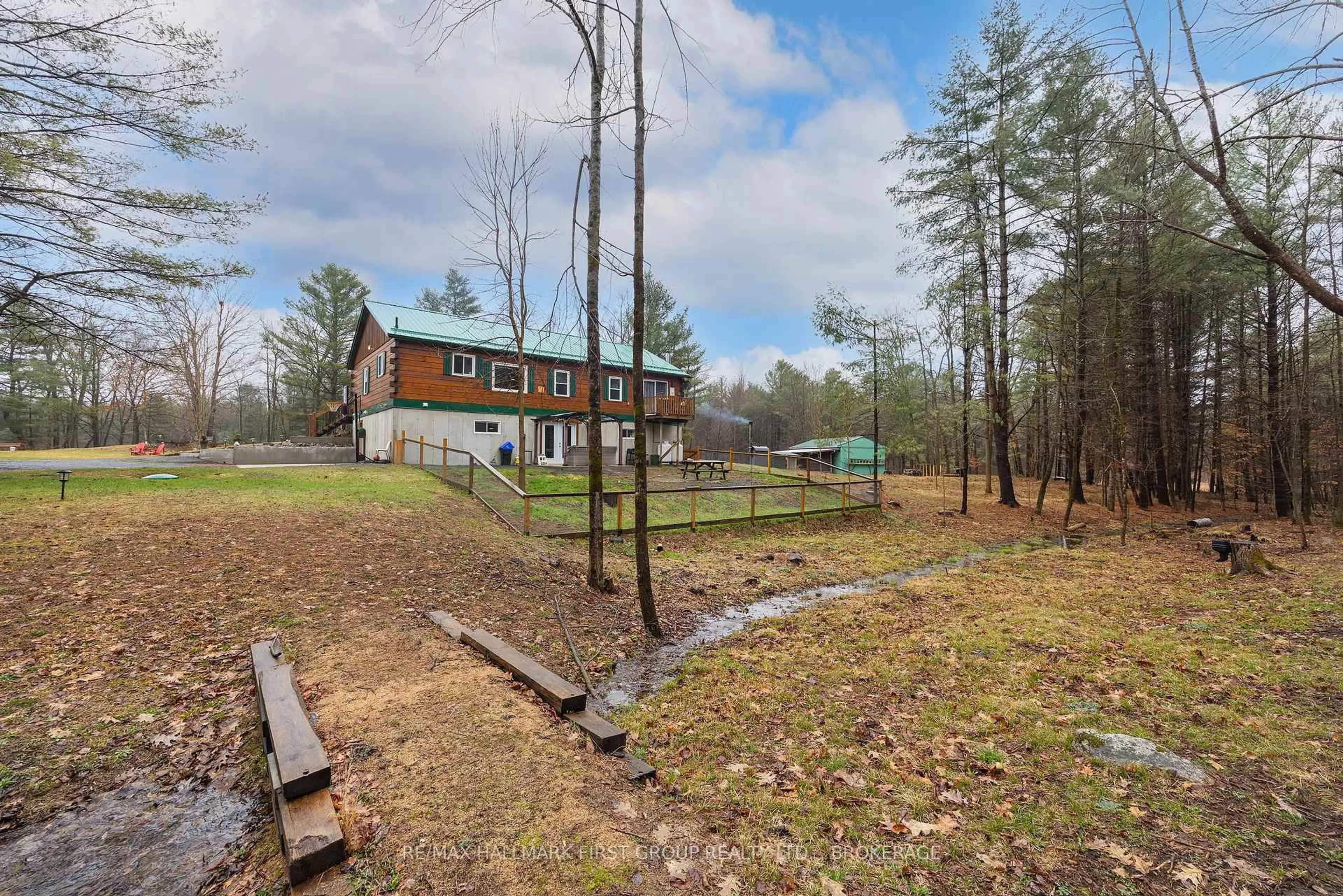 A pic from outside/outdoor area/front of a property/back of a property/a pic from drone, forest/trees view for 2723 Desert Lake Rd, Hartington Ontario K0H 1W0