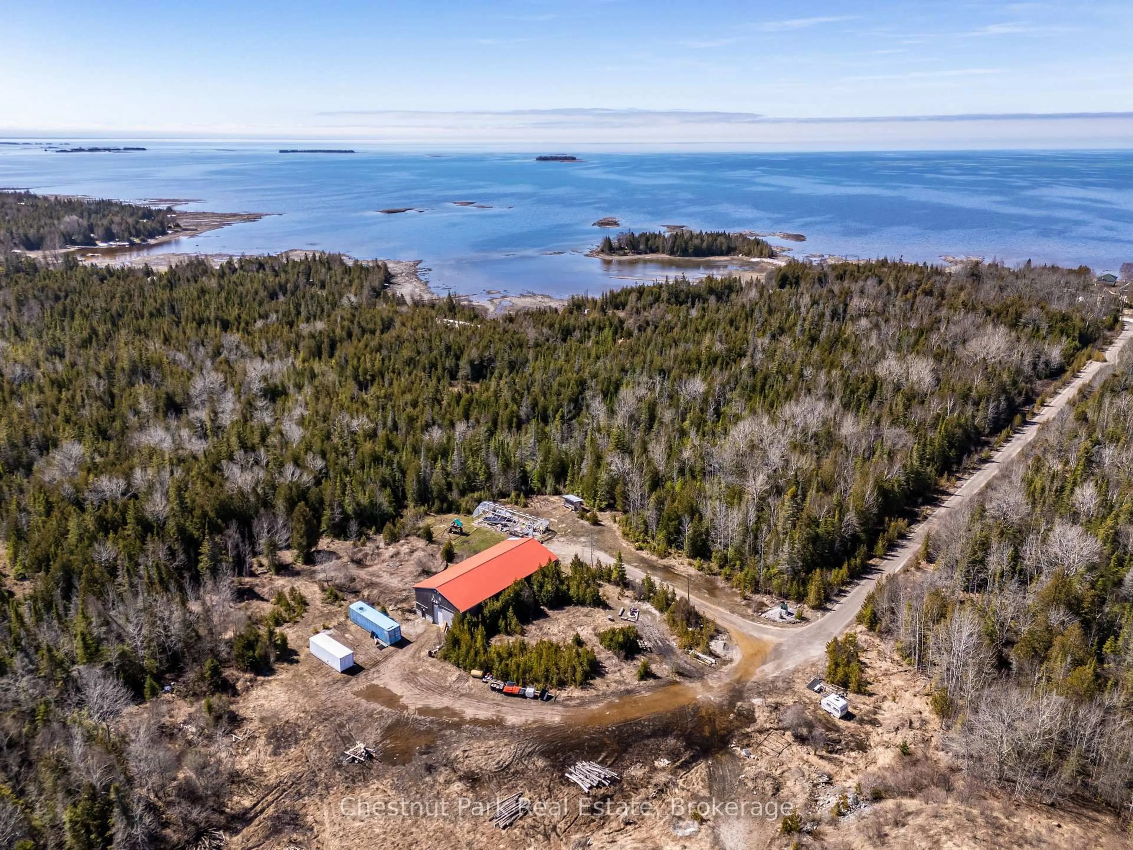 A pic from outside/outdoor area/front of a property/back of a property/a pic from drone, water/lake/river/ocean view for 1137 SUNSET Dr, South Bruce Peninsula Ontario N0H 2T0