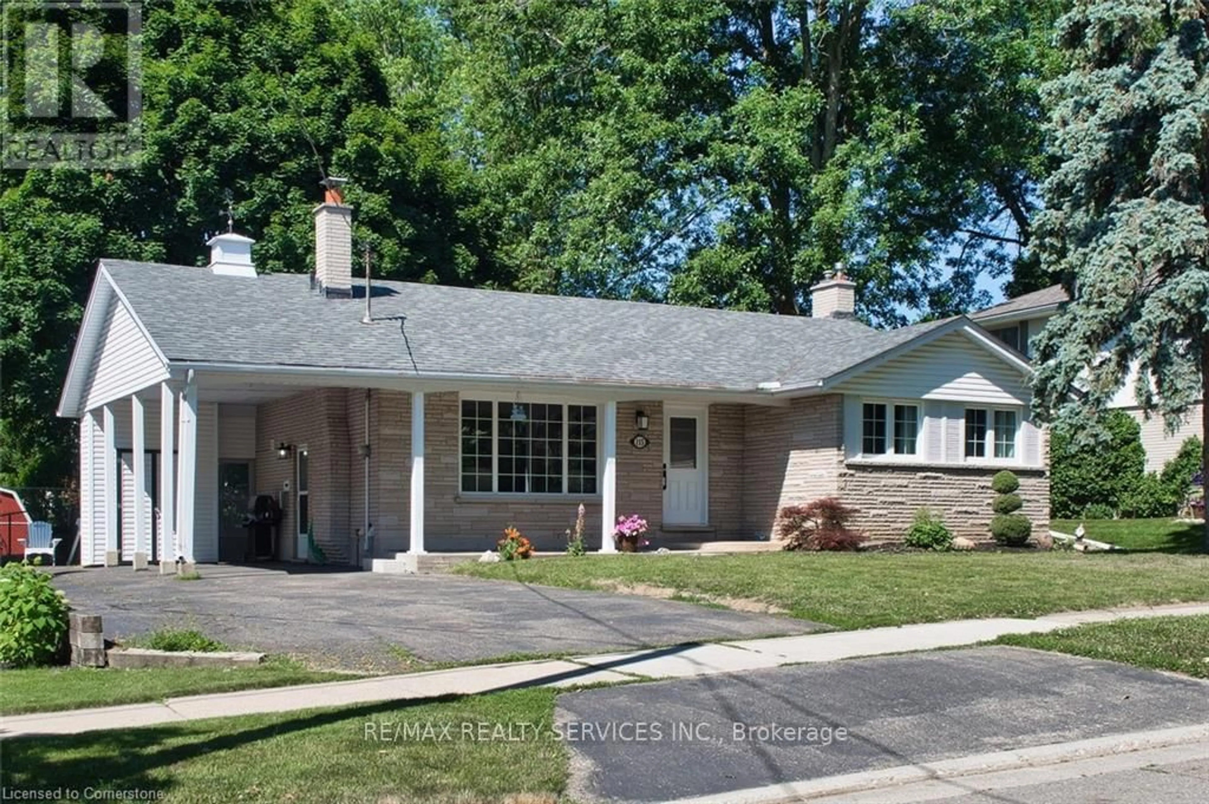 Home with brick exterior material, street for 115 Uplands Dr, Kitchener Ontario N2M 4X3