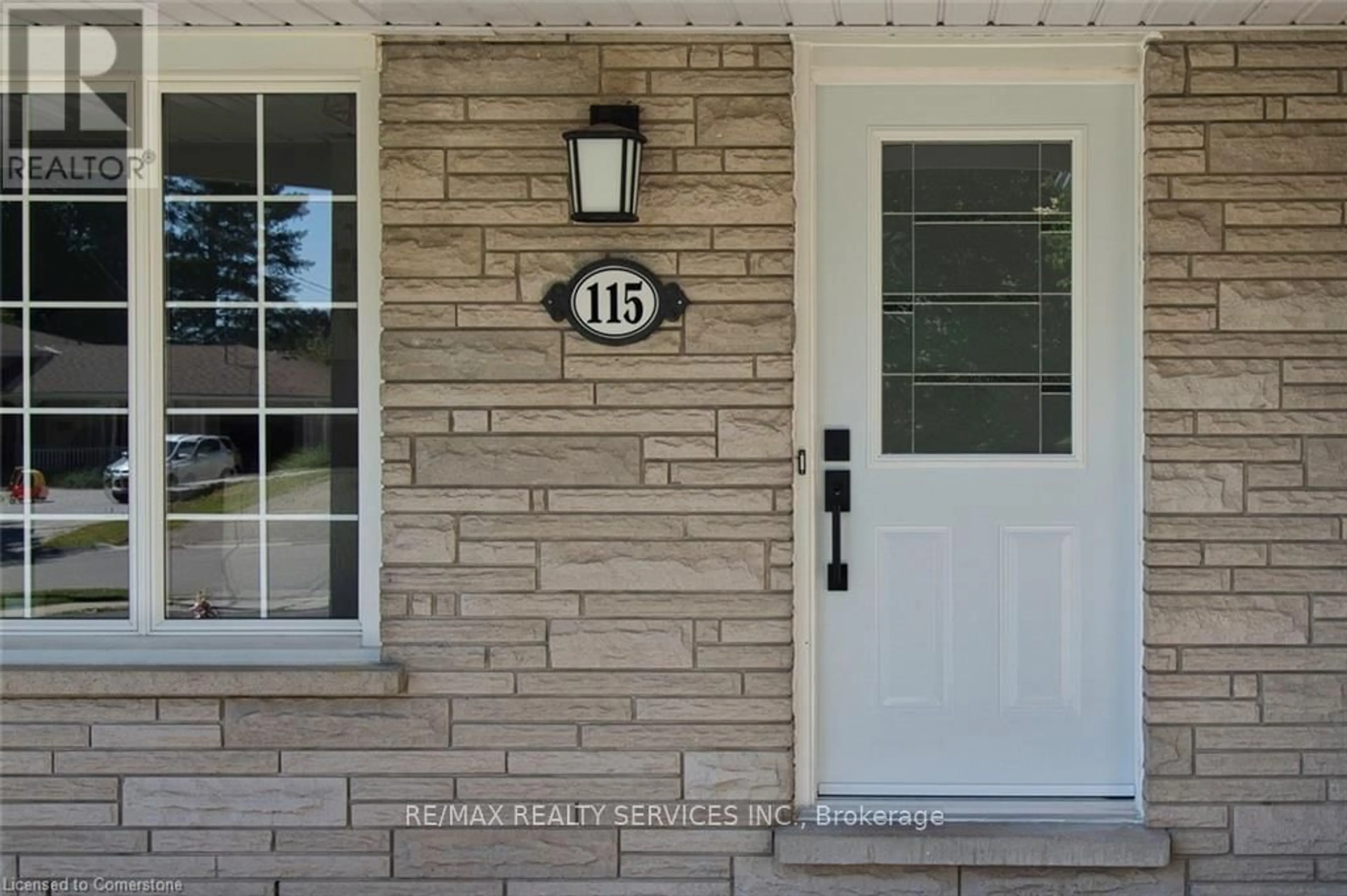 Home with brick exterior material, street for 115 Uplands Dr, Kitchener Ontario N2M 4X3