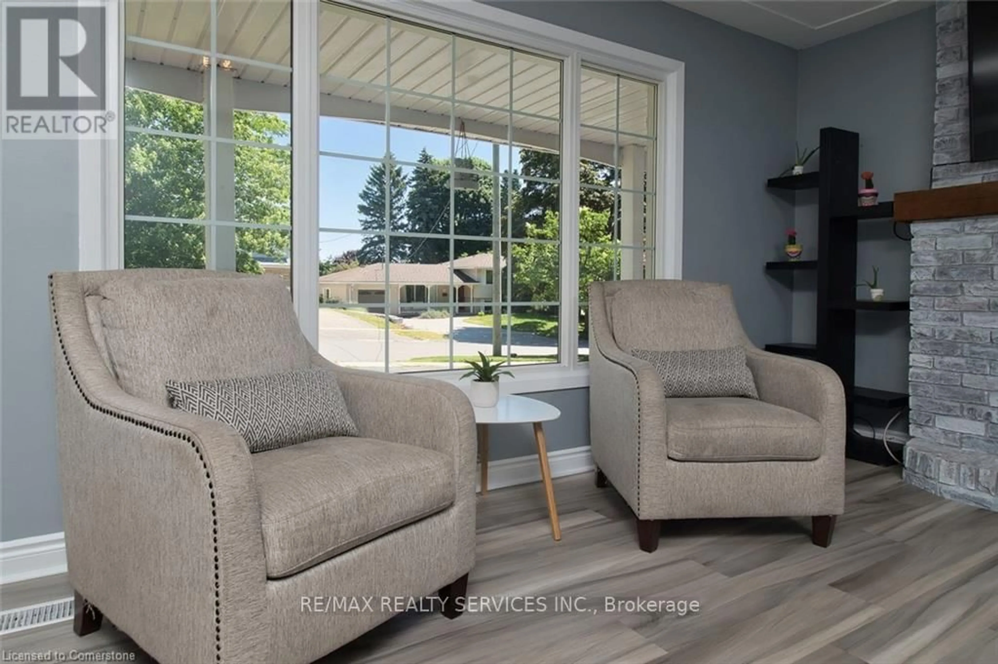 Living room with furniture, unknown for 115 Uplands Dr, Kitchener Ontario N2M 4X3