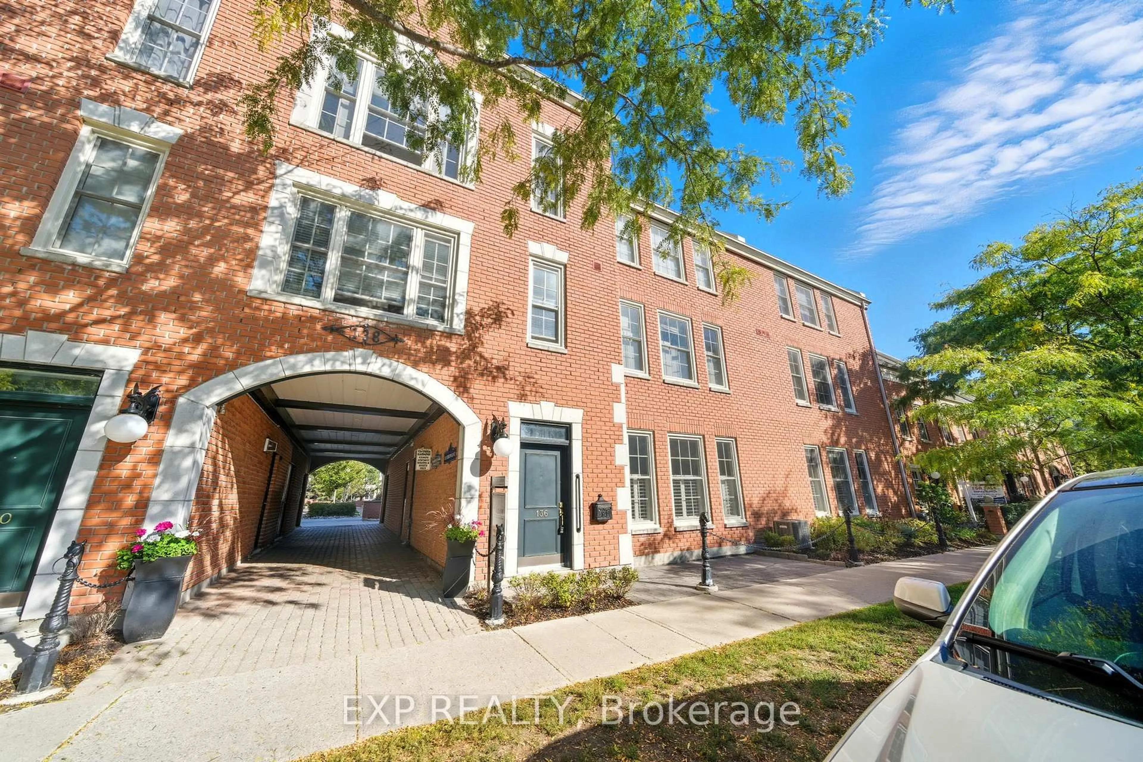 Home with brick exterior material, street for 136 Hibernia St #102, Cobourg Ontario K9A 3J8