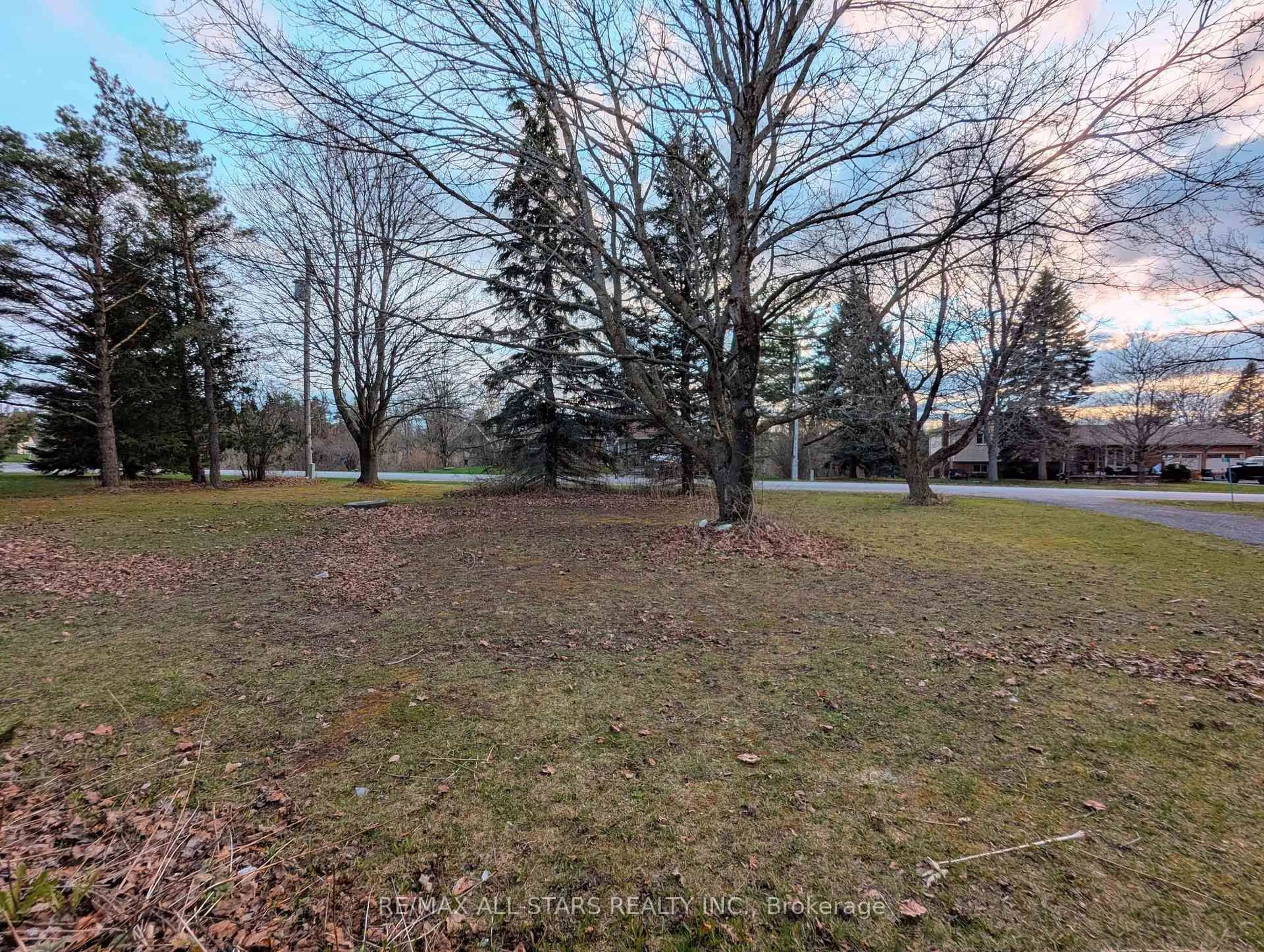A pic from outside/outdoor area/front of a property/back of a property/a pic from drone, forest/trees view for 23 Valley Rd, Cavan Monaghan Ontario L0A 1G0