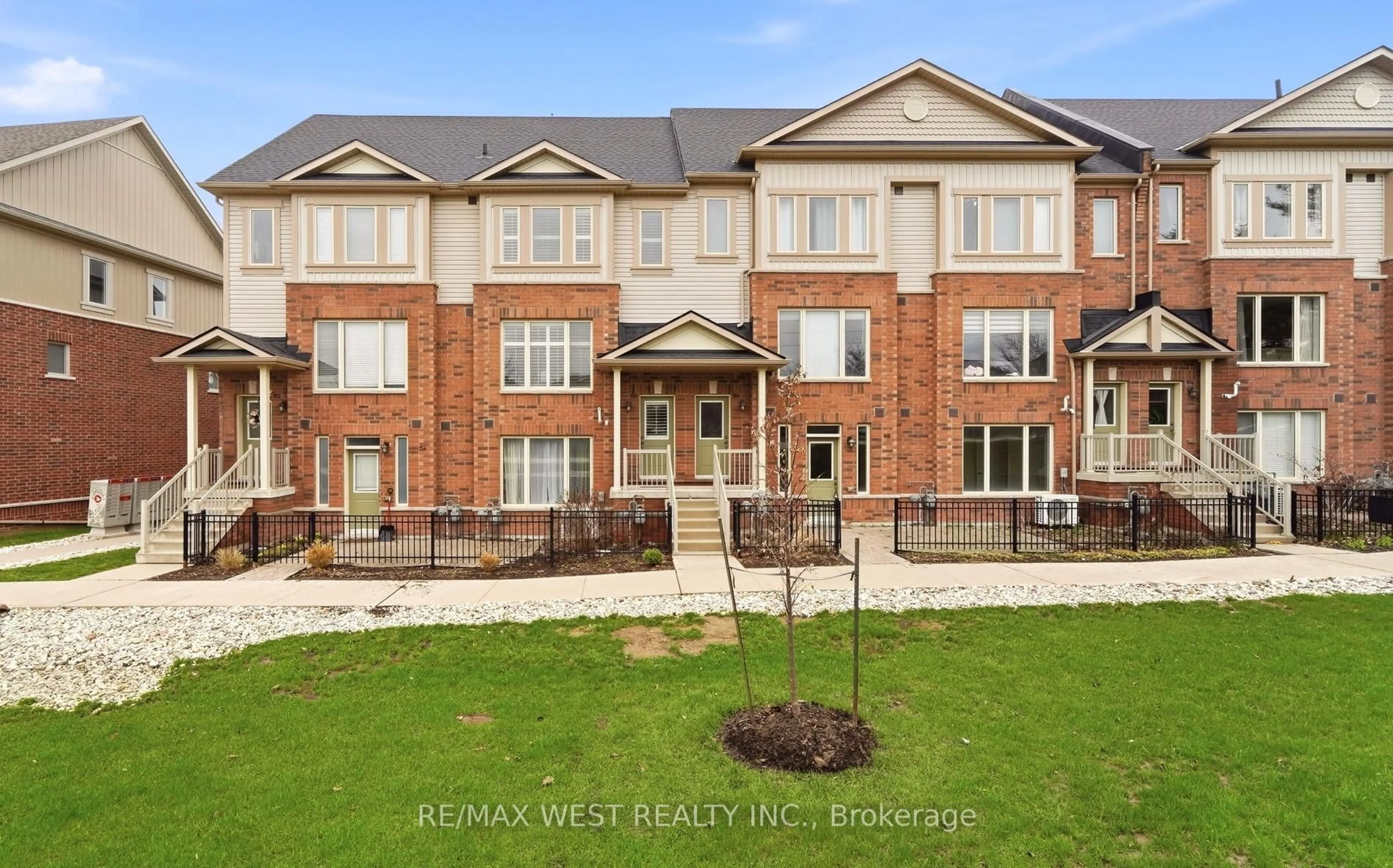 A pic from outside/outdoor area/front of a property/back of a property/a pic from drone, street for 156 Watson Pkwy #156, Guelph Ontario N1E 0P6