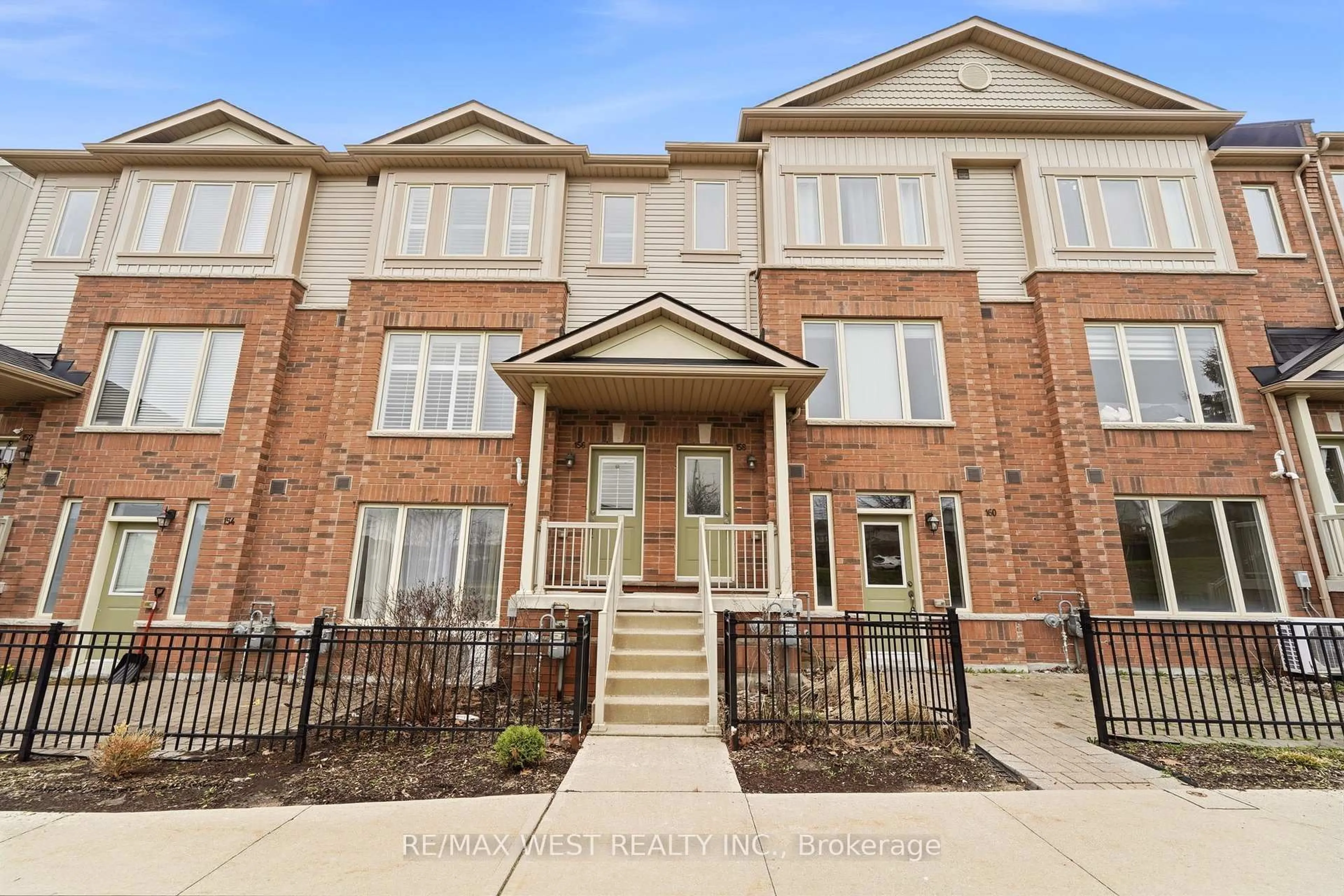 Home with brick exterior material, street for 156 Watson Pkwy #156, Guelph Ontario N1E 0P6