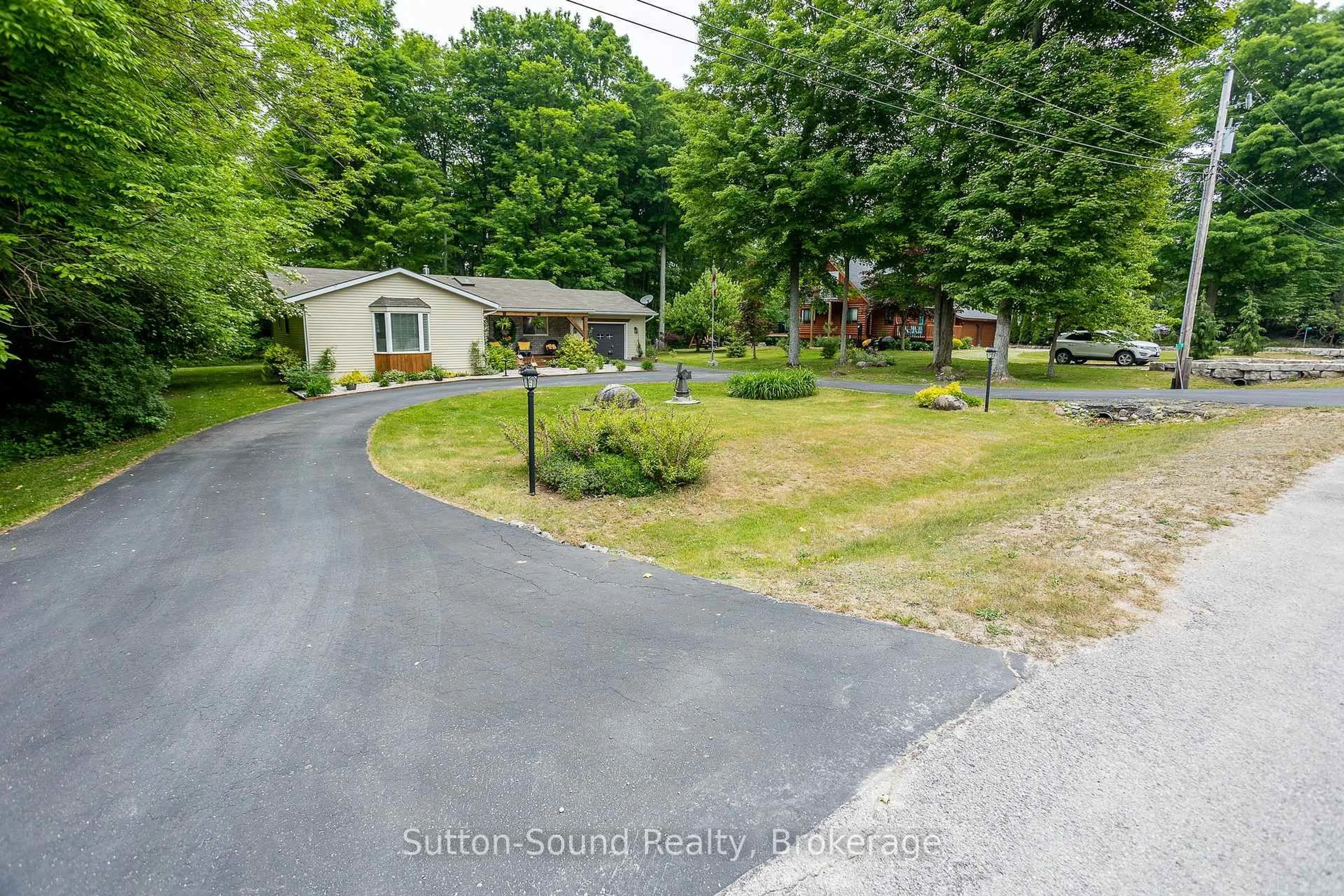 A pic from outside/outdoor area/front of a property/back of a property/a pic from drone, street for 7 Sandy Pines Tr, South Bruce Peninsula Ontario N0H 2G0