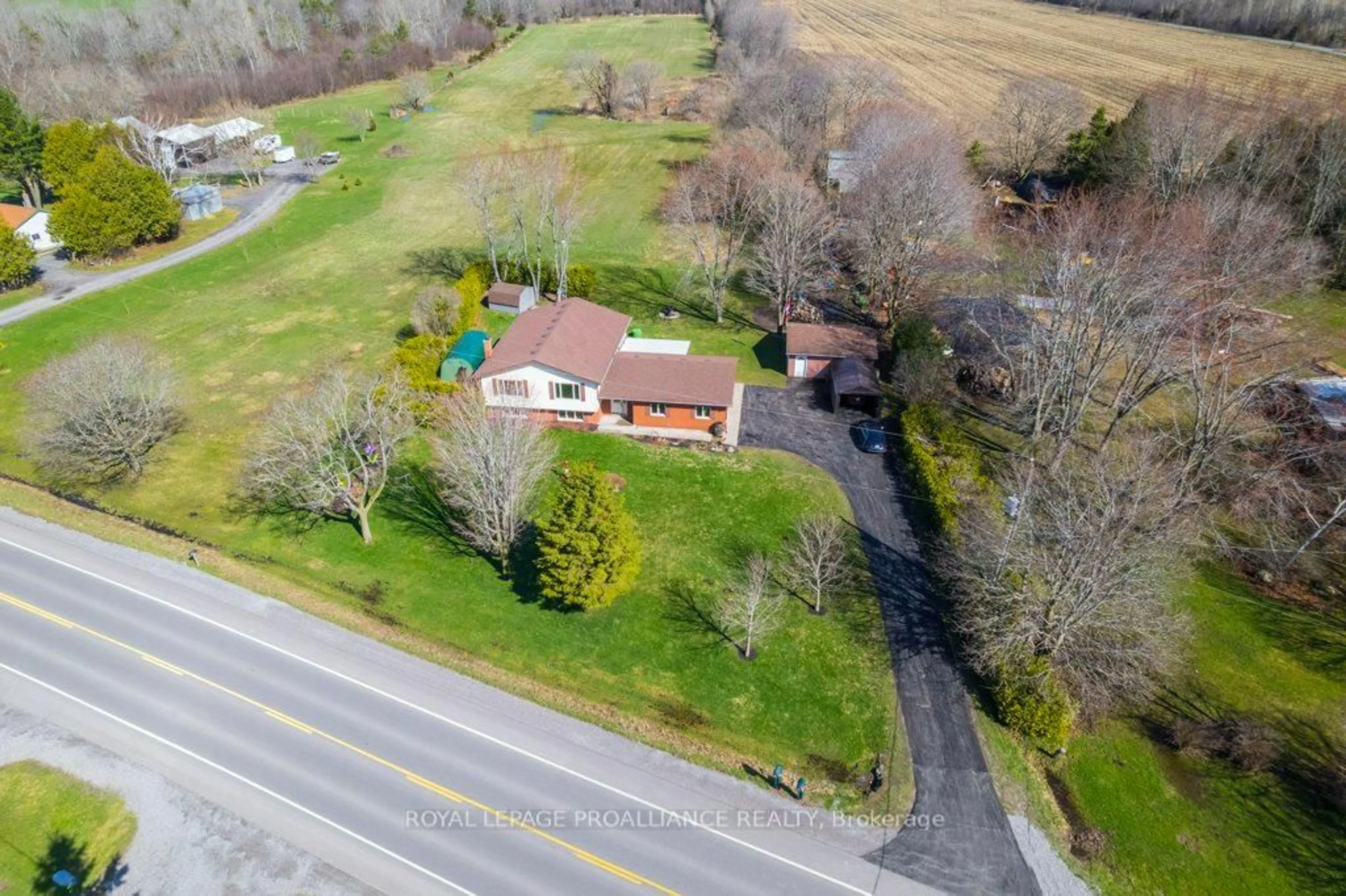 A pic from outside/outdoor area/front of a property/back of a property/a pic from drone, street for 858 County Road 64 Rd, Brighton Ontario K0K 1H0