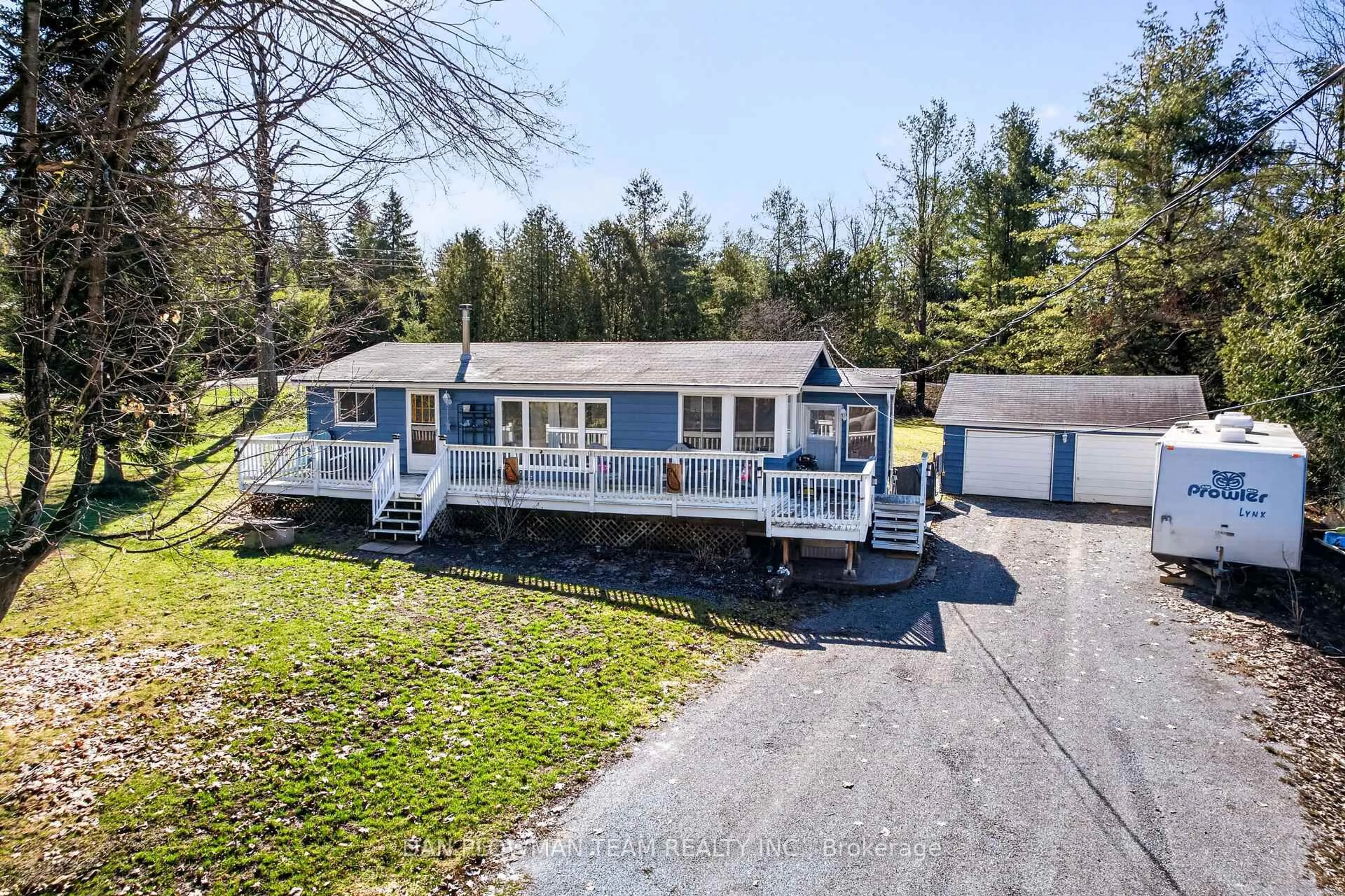 A pic from outside/outdoor area/front of a property/back of a property/a pic from drone, water/lake/river/ocean view for 1545 Westview Cres, Selwyn Ontario K0L 2H0