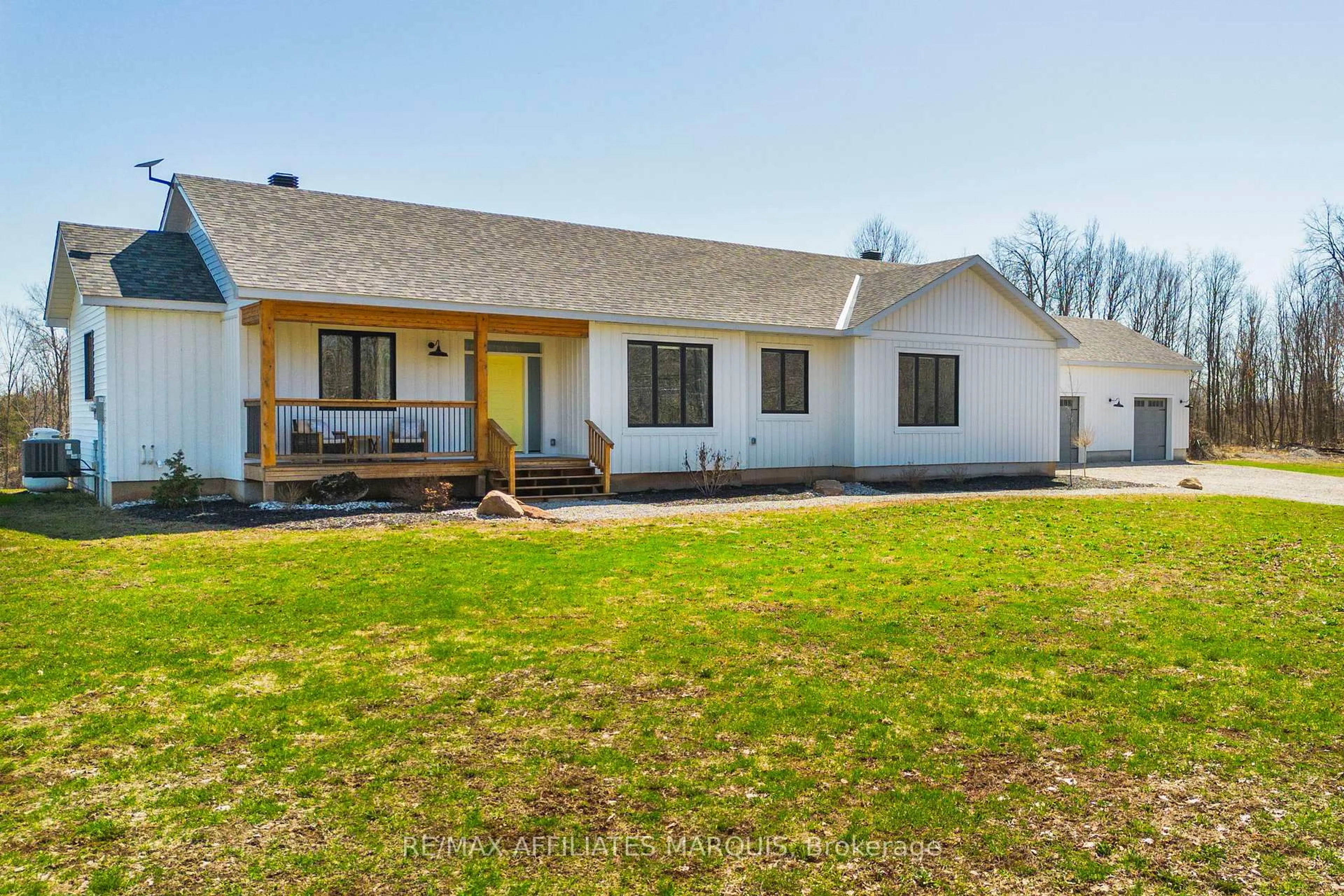 A pic from outside/outdoor area/front of a property/back of a property/a pic from drone, street for 4421M Old Kingston Rd, Rideau Lakes Ontario K0G 1V0