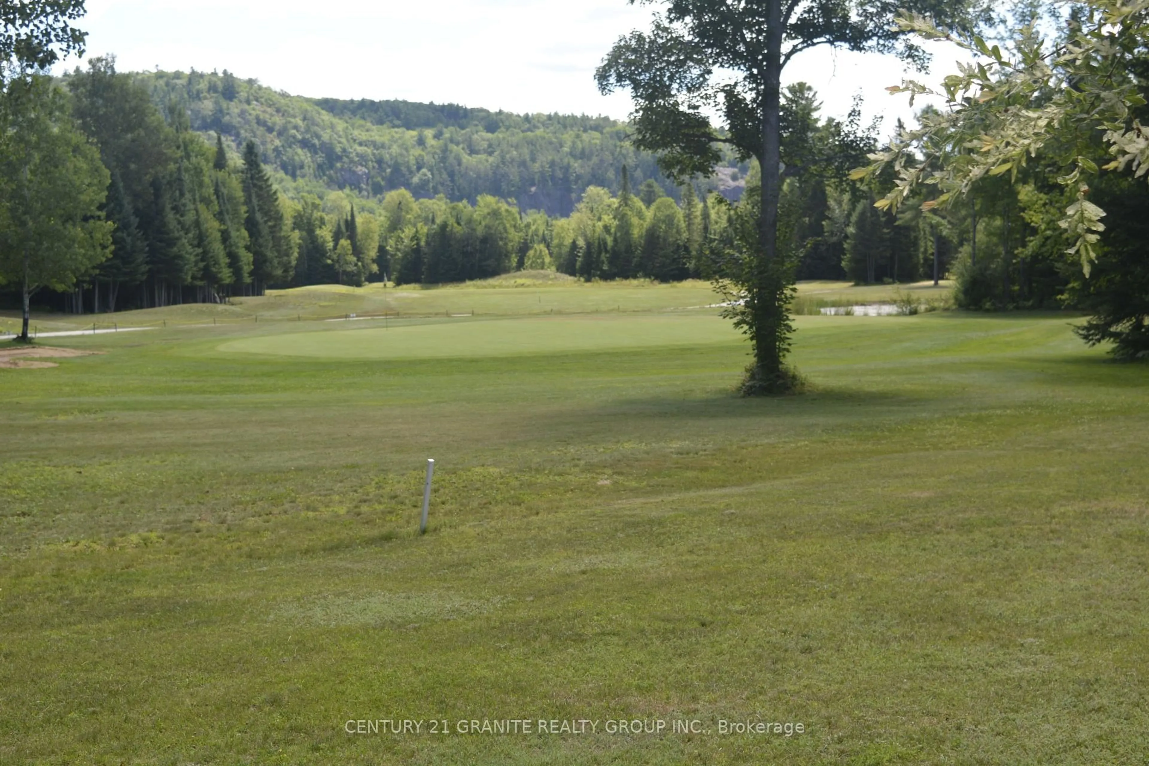 A pic from outside/outdoor area/front of a property/back of a property/a pic from drone, forest/trees view for 52 Nicklaus Dr, Bancroft Ontario K0L 1C0