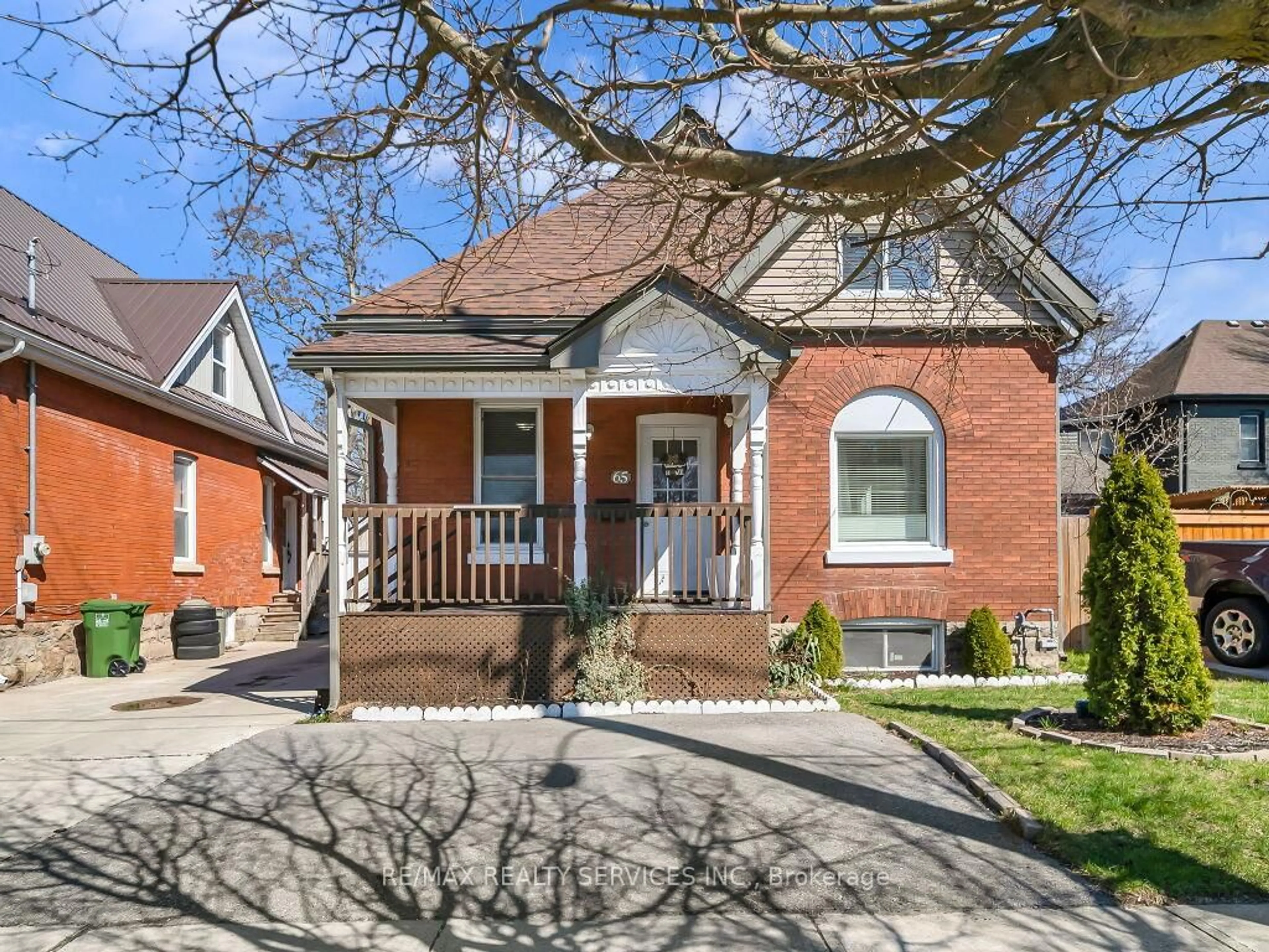 Home with brick exterior material, street for 65 MOORE St, St. Thomas Ontario N5R 3W4