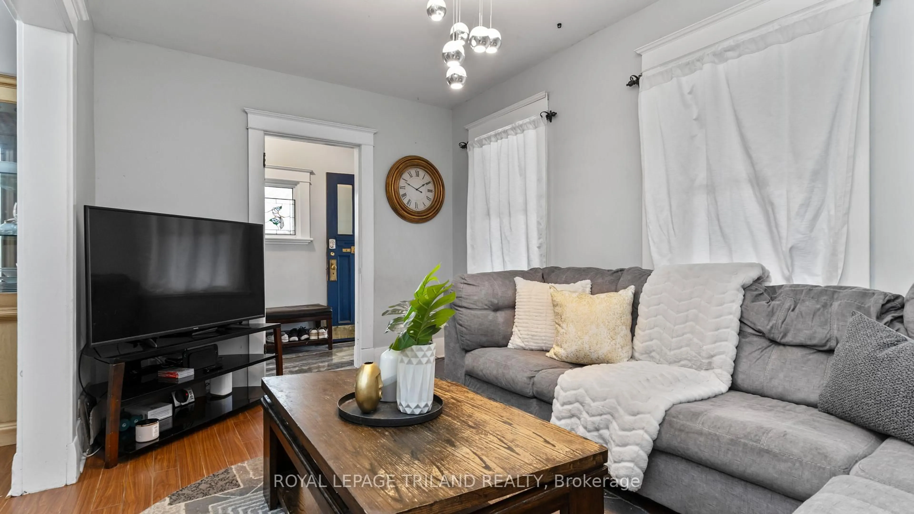 Living room with furniture, wood/laminate floor for 41 GUNN St, London North Ontario N6G 1C6