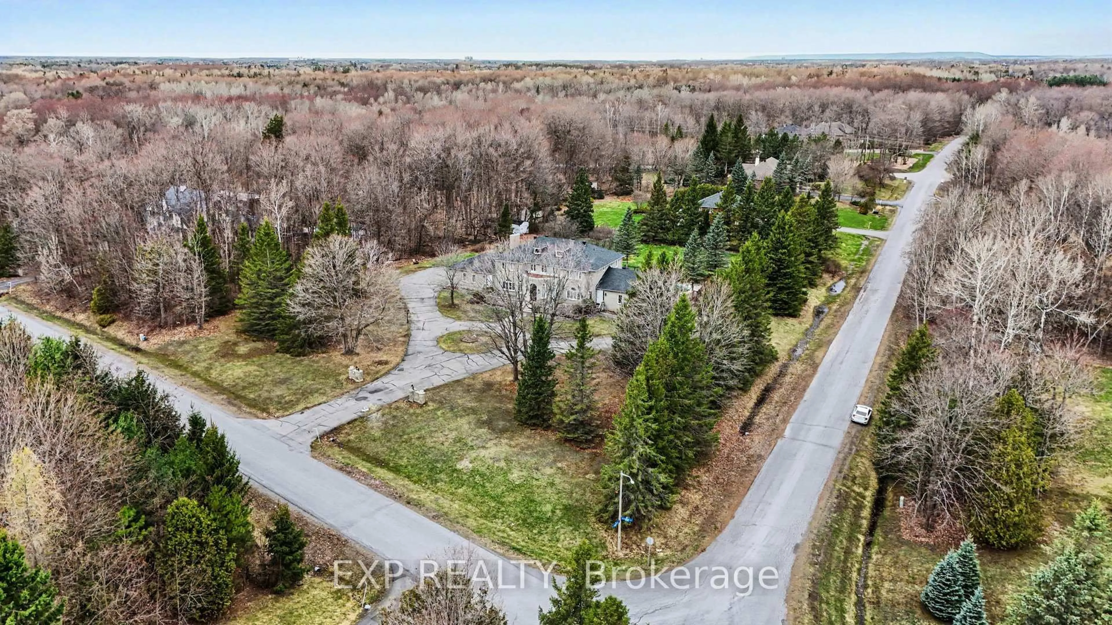 A pic from outside/outdoor area/front of a property/back of a property/a pic from drone, forest/trees view for 5749 Knights Dr, Ottawa Ontario K4M 1K2