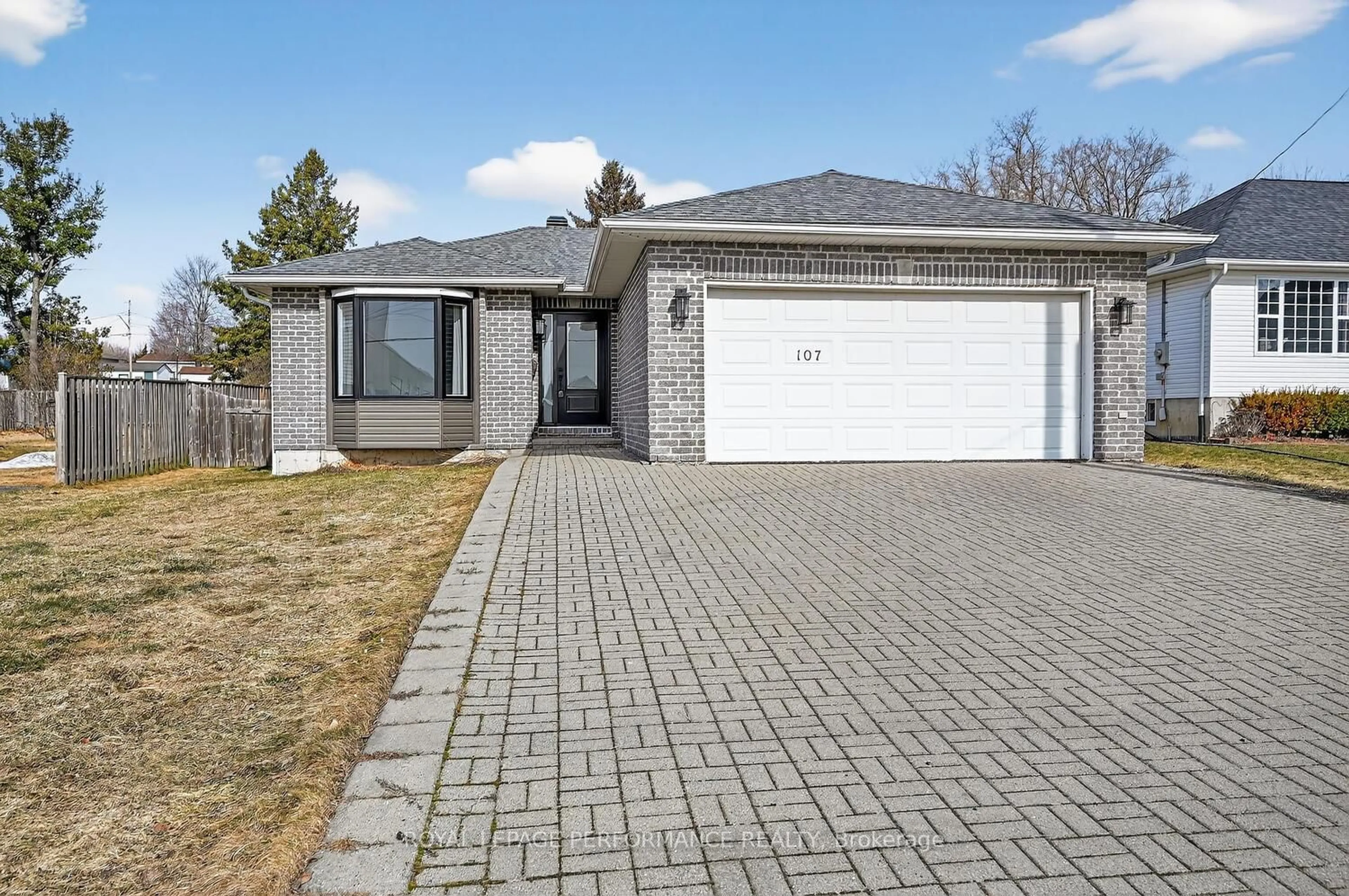 Home with brick exterior material, street for 107 Lorne St, Smiths Falls Ontario K7A 3L1