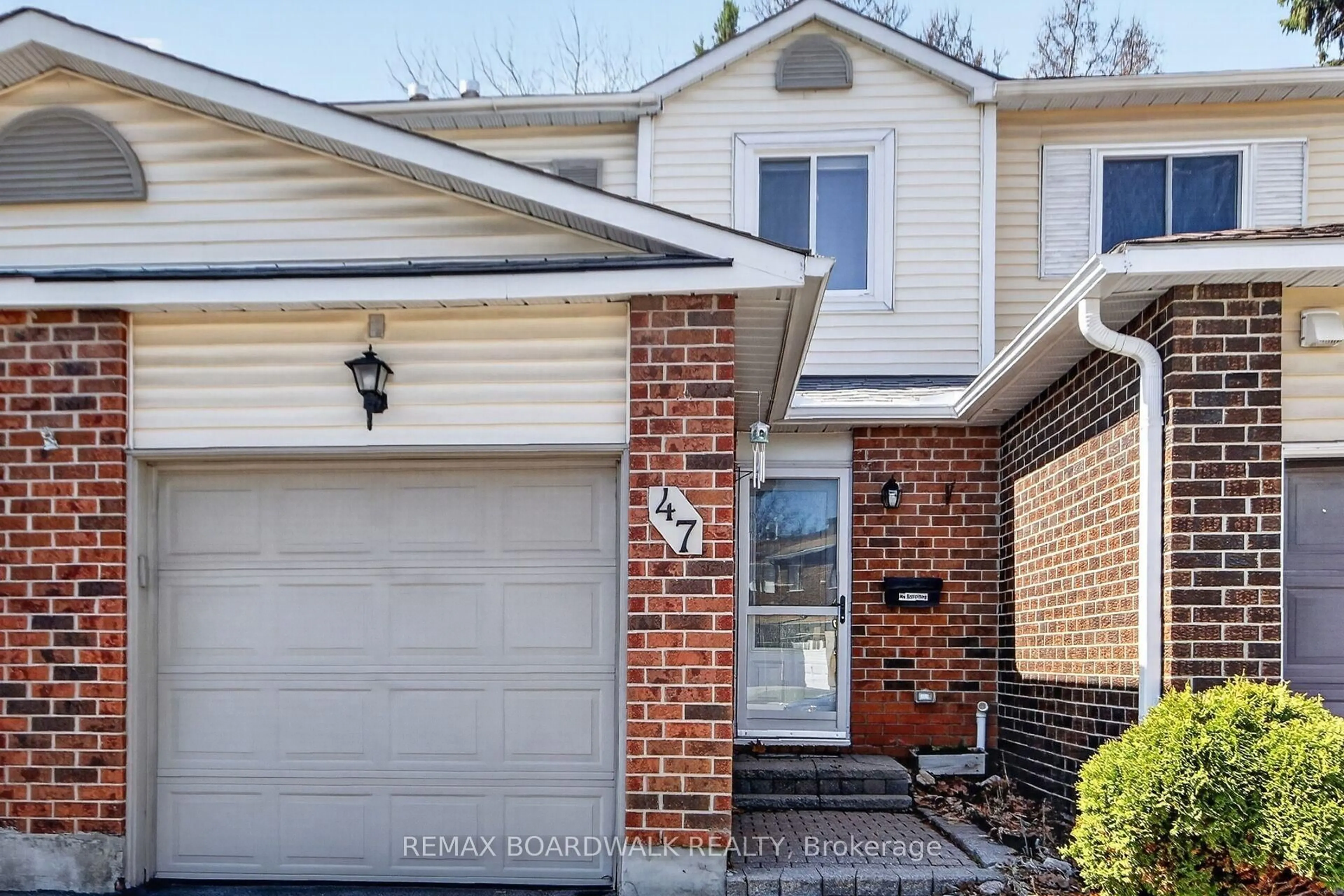 Home with brick exterior material, street for 47 Sunridge Lane #10, Ottawa Ontario K2J 2N9