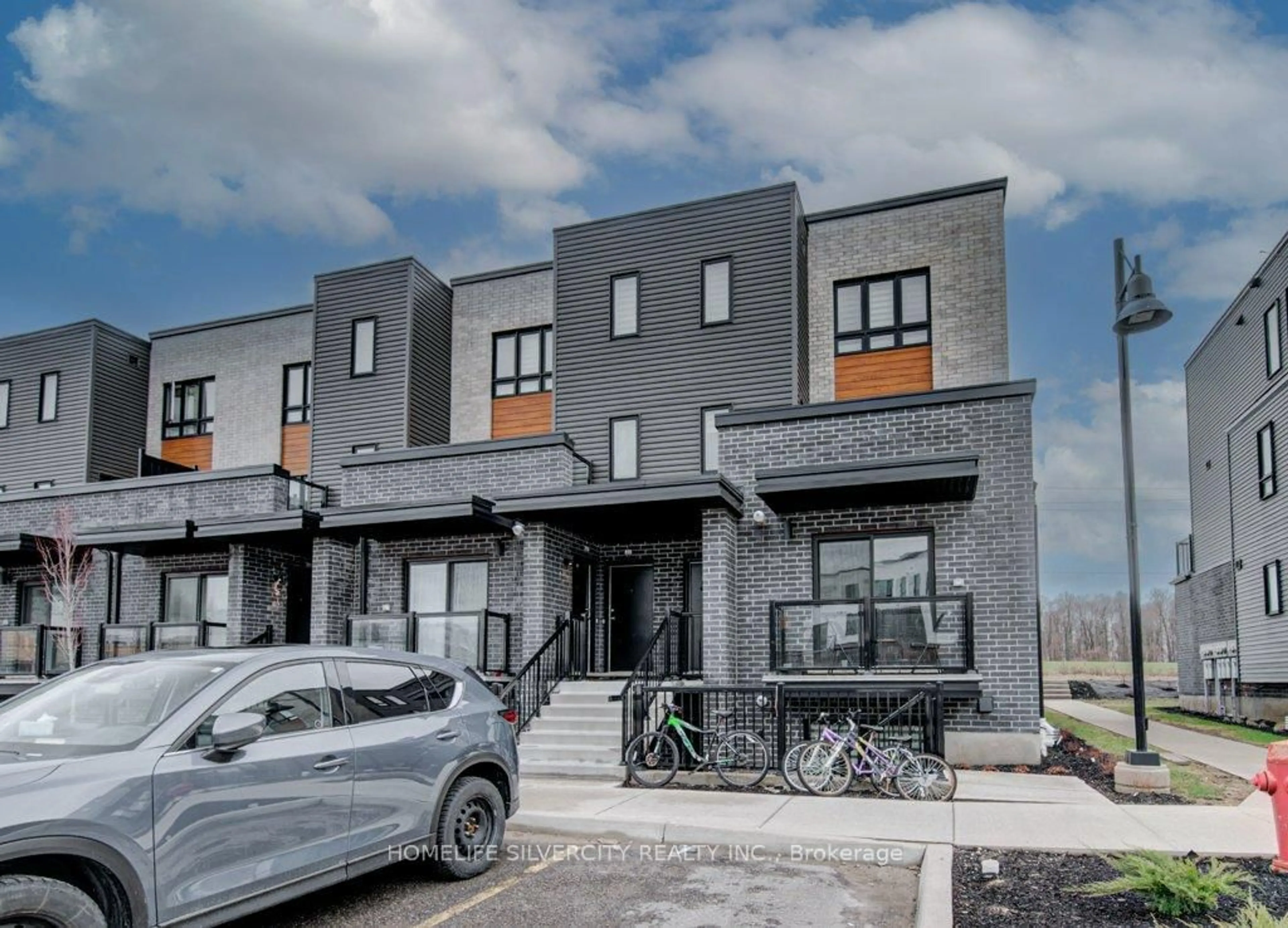 Home with brick exterior material, street for 235 Chapel Hill Dr ##18, Kitchener Ontario N2R 0S4