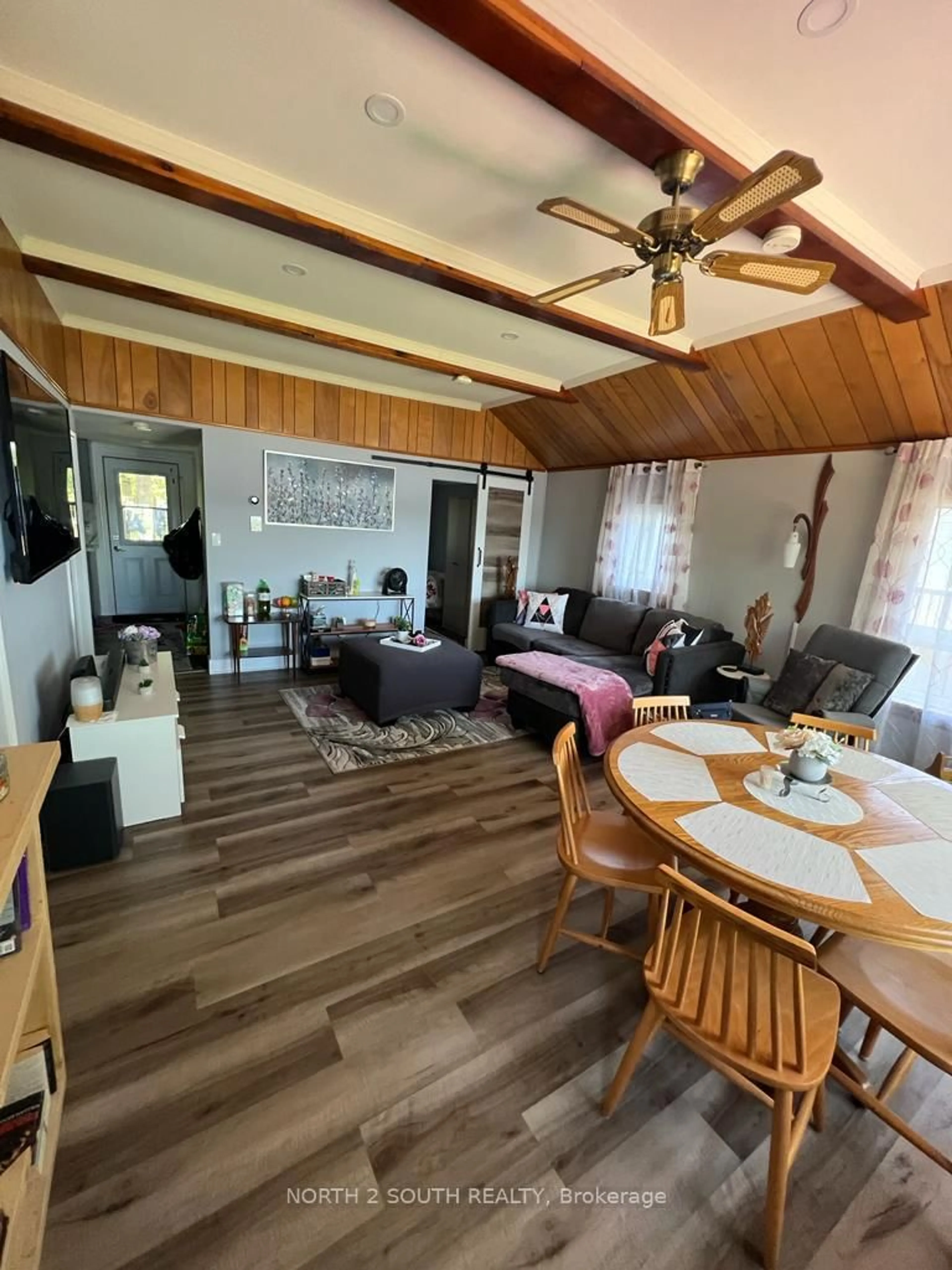 Living room with furniture, wood/laminate floor for 55 Paradise Rd, Kawartha Lakes Ontario K0M 1B0