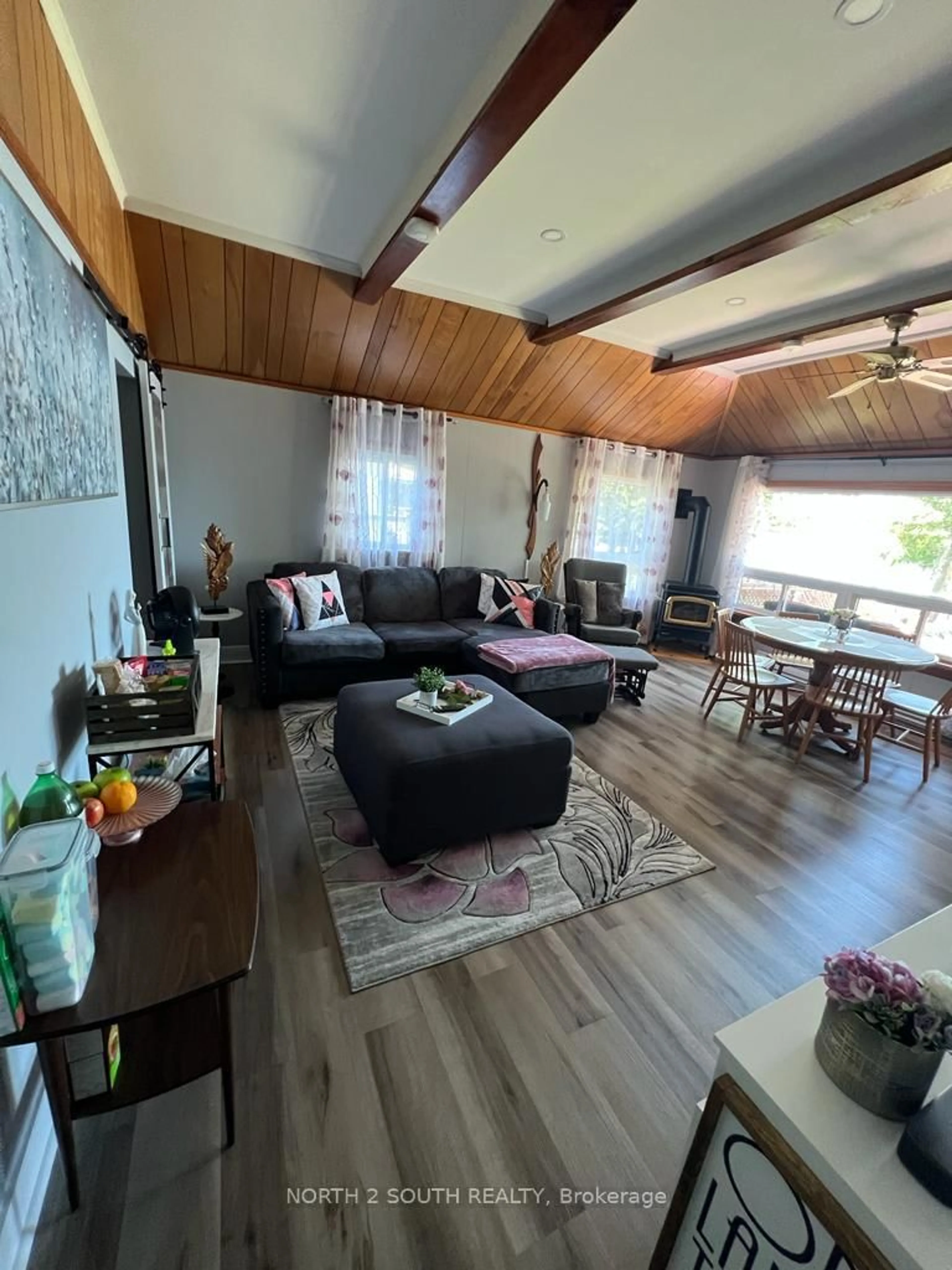 Living room with furniture, wood/laminate floor for 55 Paradise Rd, Kawartha Lakes Ontario K0M 1B0