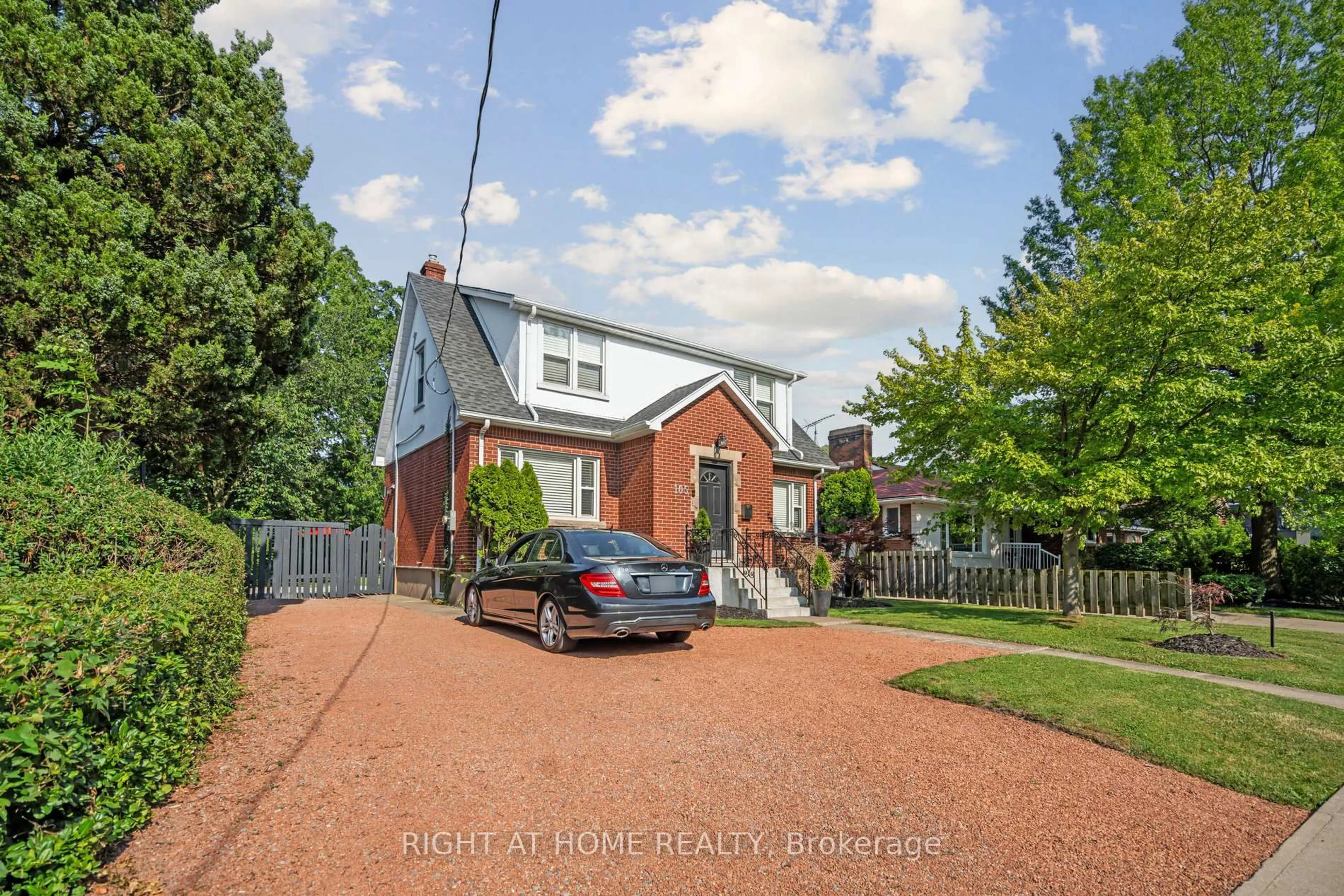 A pic from outside/outdoor area/front of a property/back of a property/a pic from drone, street for 105 Glenridge Ave, St. Catharines Ontario L2R 4X5