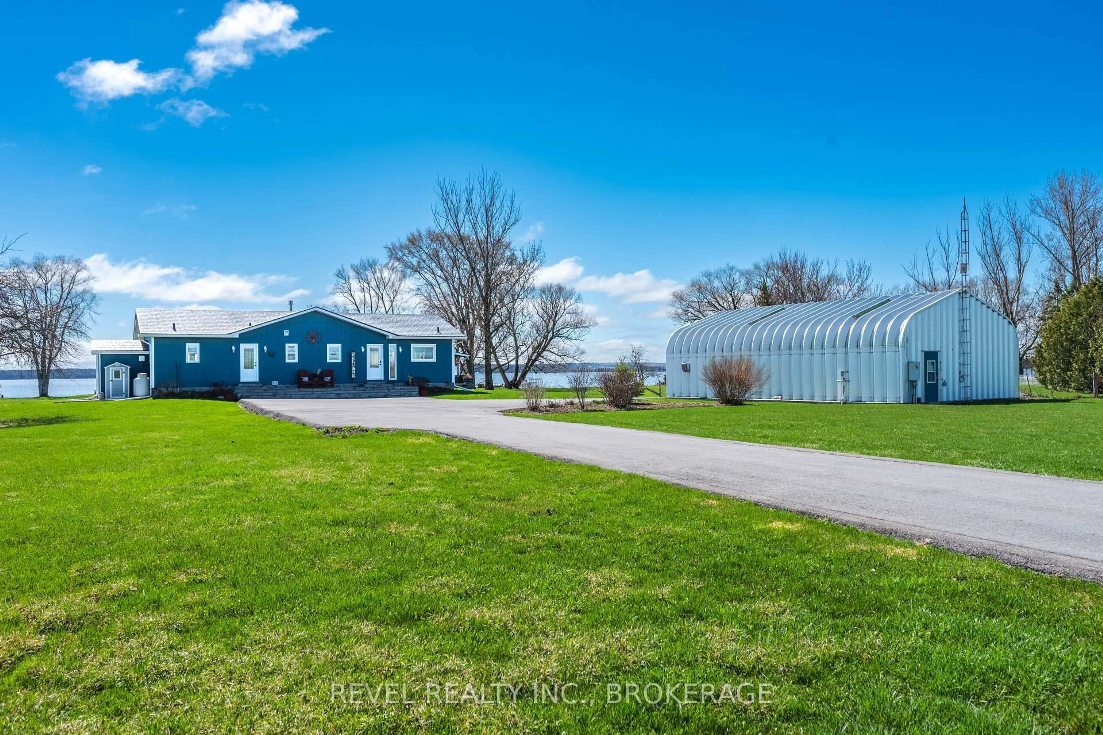 A pic from outside/outdoor area/front of a property/back of a property/a pic from drone, water/lake/river/ocean view for 6349 County Rd 9, Napanee Ontario K7R 3K8