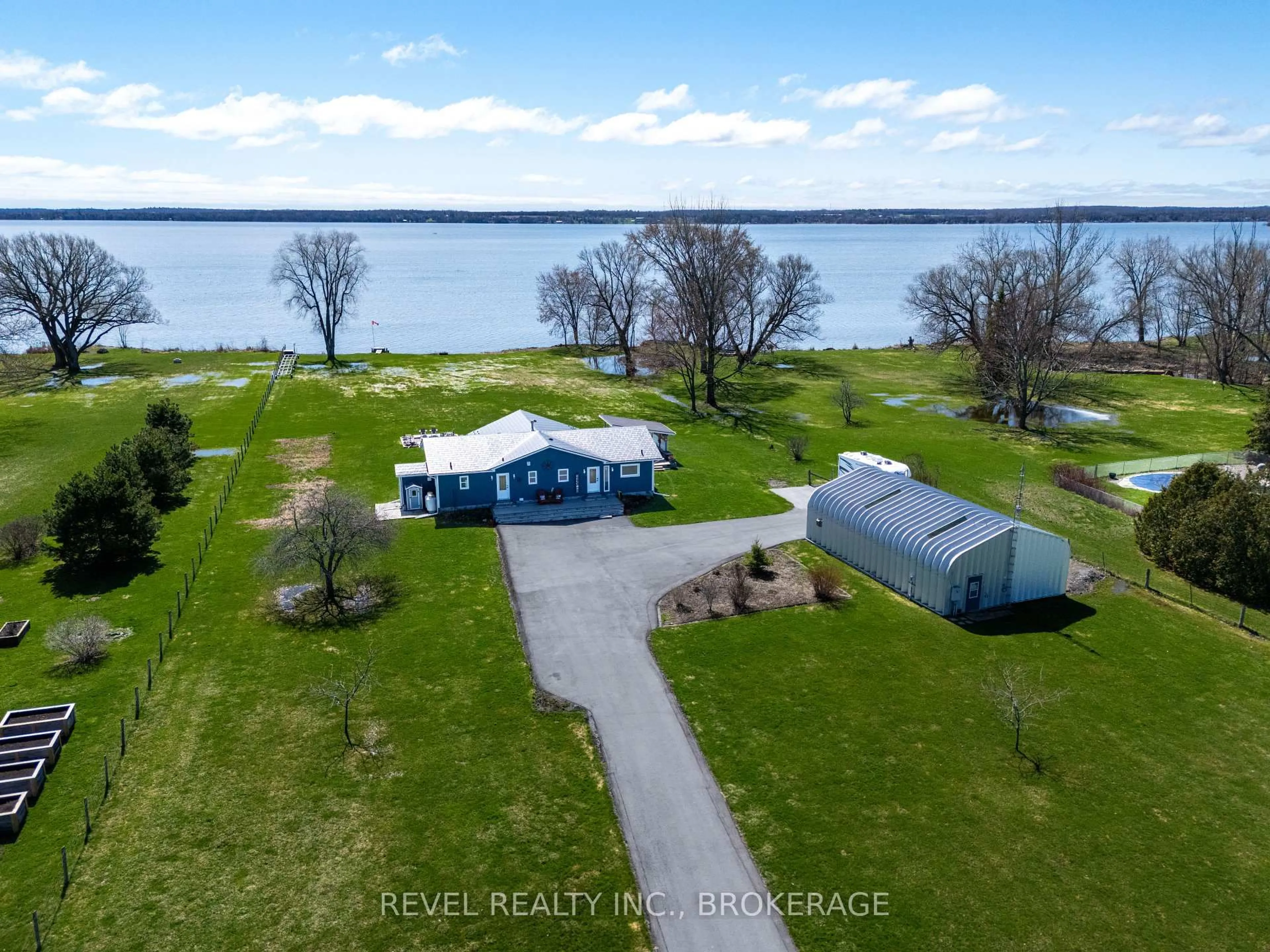 A pic from outside/outdoor area/front of a property/back of a property/a pic from drone, water/lake/river/ocean view for 6349 County Rd 9, Napanee Ontario K7R 3K8