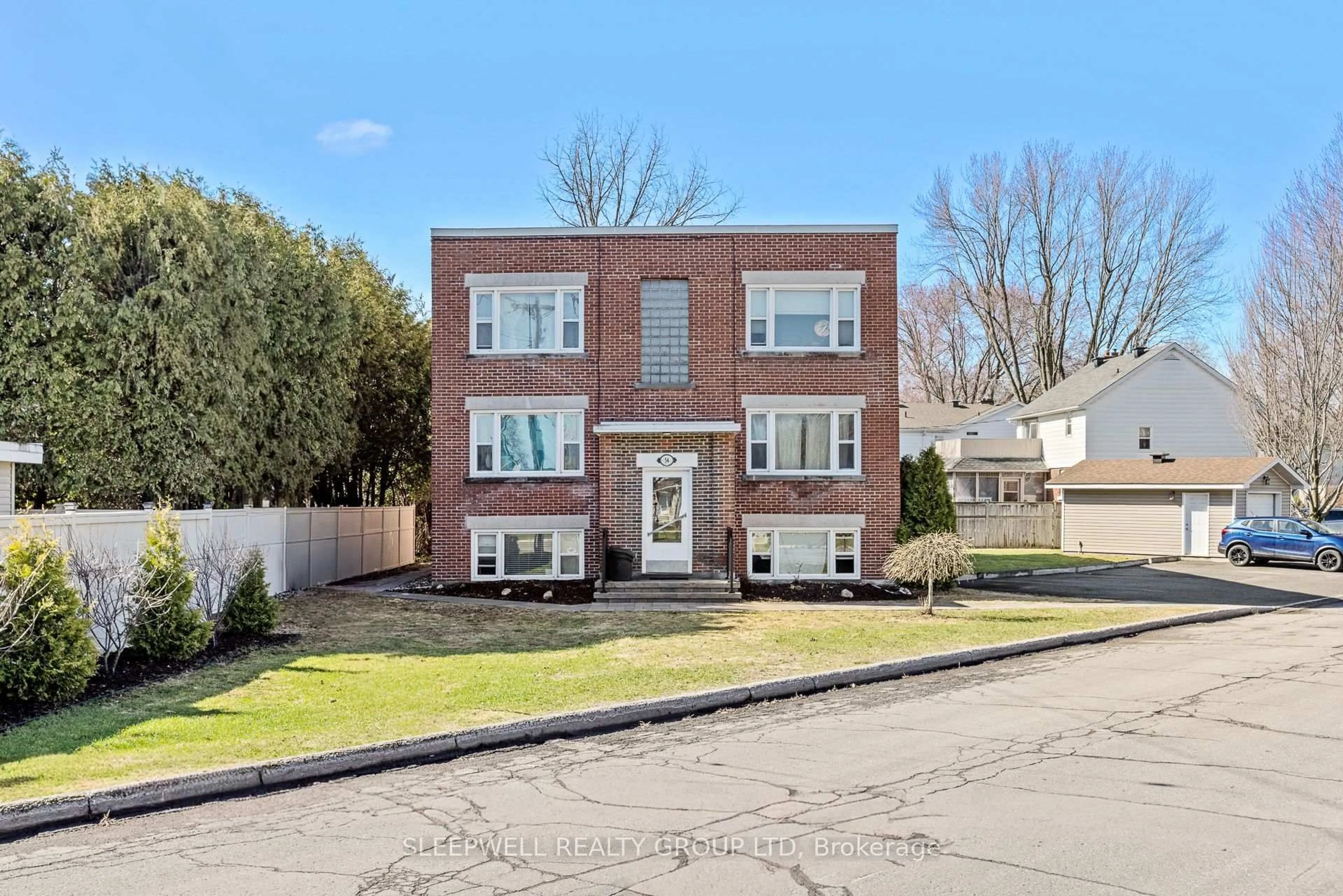 Home with brick exterior material, street for 54 Centennial Blvd, Ottawa Ontario K1S 0M9