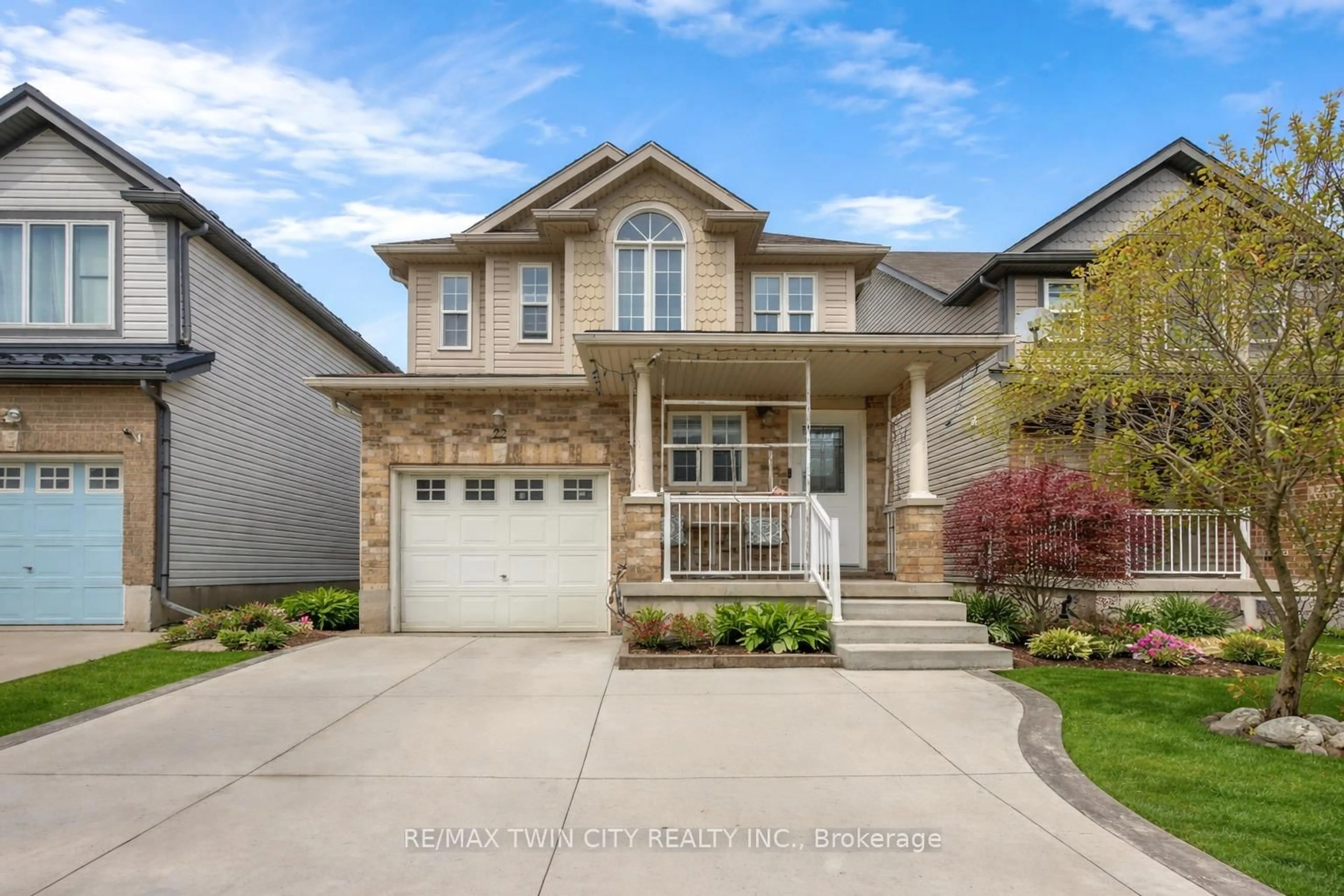 Home with brick exterior material, street for 22 Dahlia St, Kitchener Ontario N2E 4A9