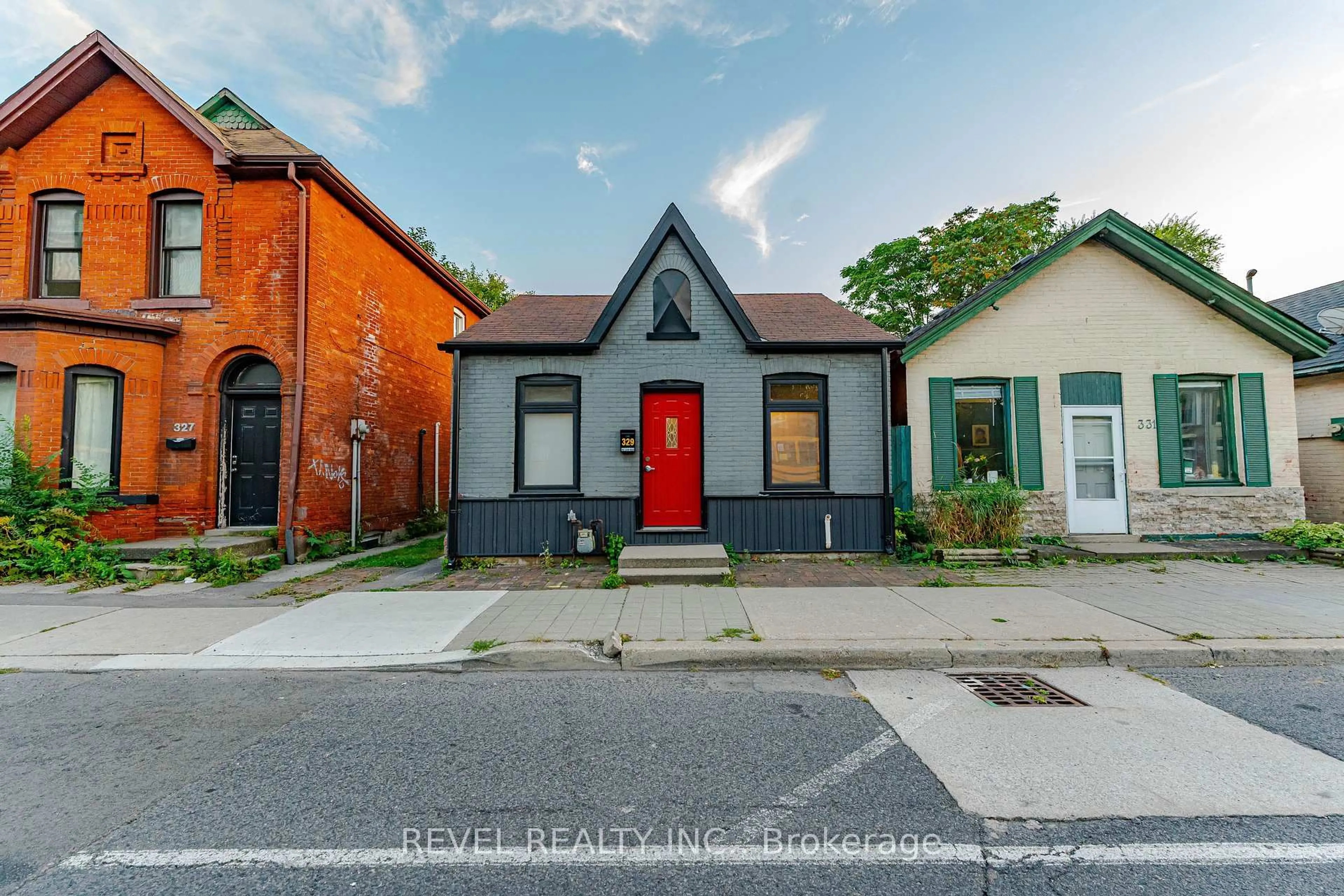 Home with brick exterior material, street for 329 Main St, Hamilton Ontario L8P 1K1