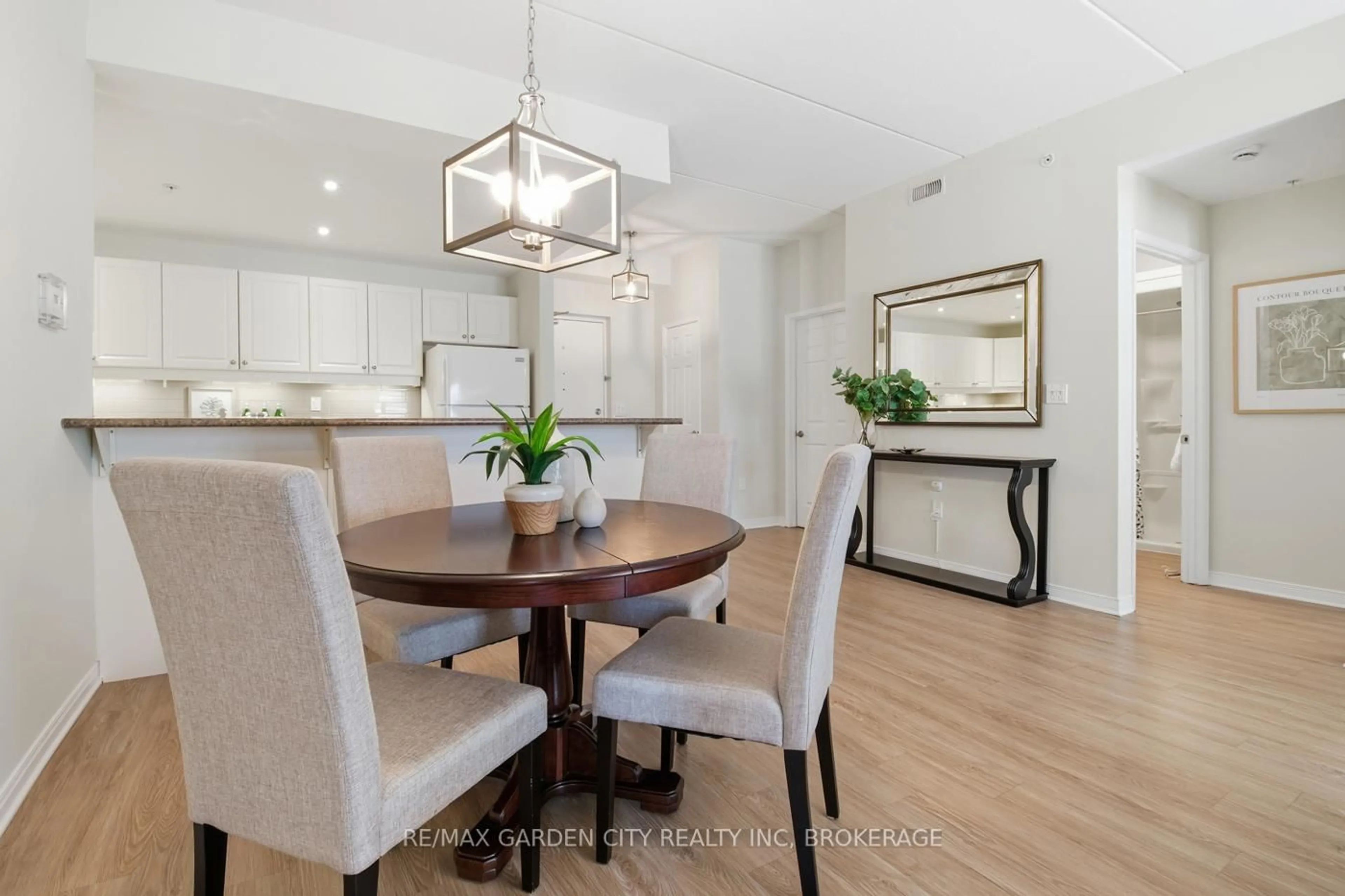 Dining room, wood/laminate floor for 16 Sullivan Ave #307, Thorold Ontario L2V 2Y2