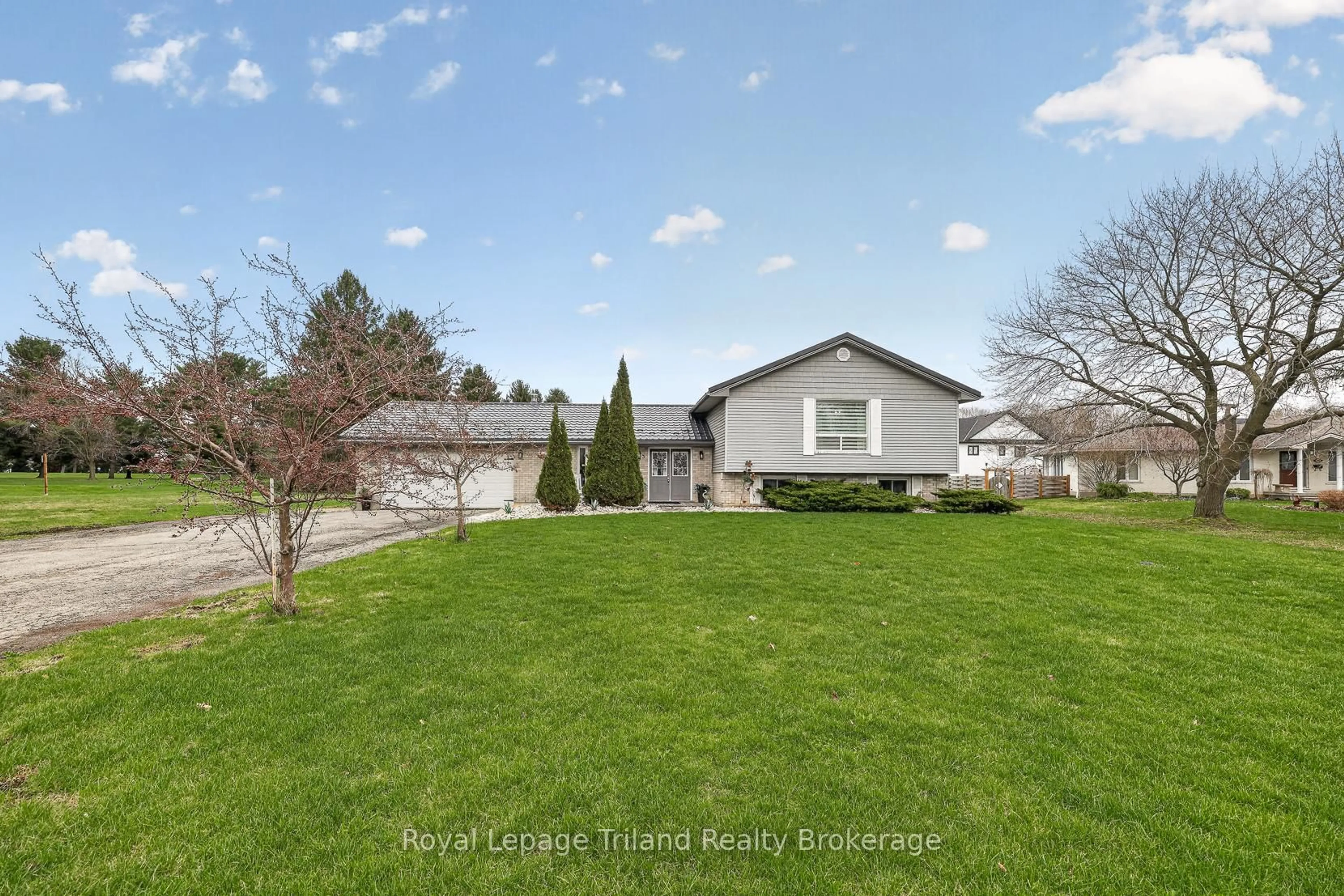 A pic from outside/outdoor area/front of a property/back of a property/a pic from drone, water/lake/river/ocean view for 293 Whiting St, Ingersoll Ontario N5C 3P7